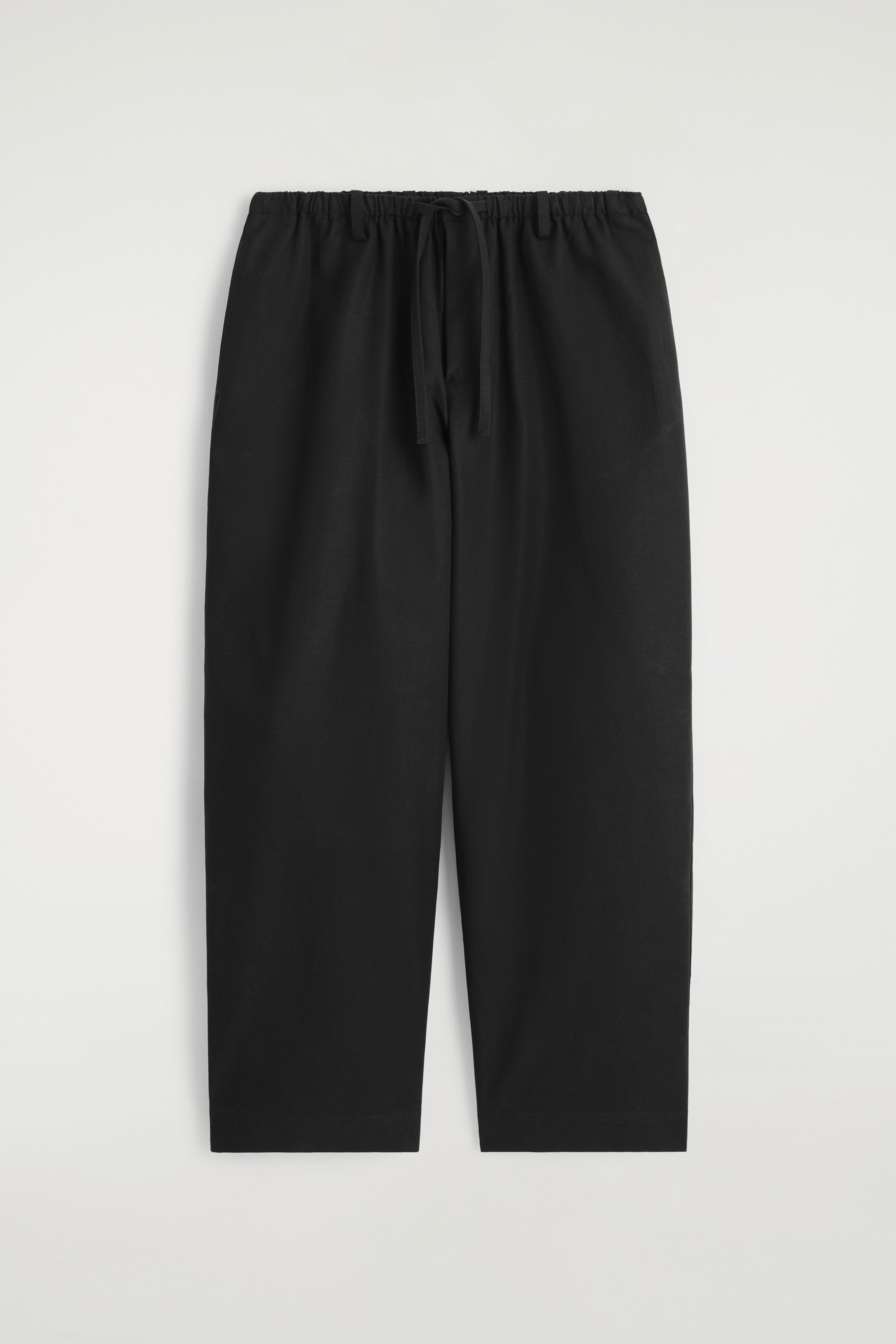 BROEK MET TROMPETPANTER EN TREKKOORD - ZWART