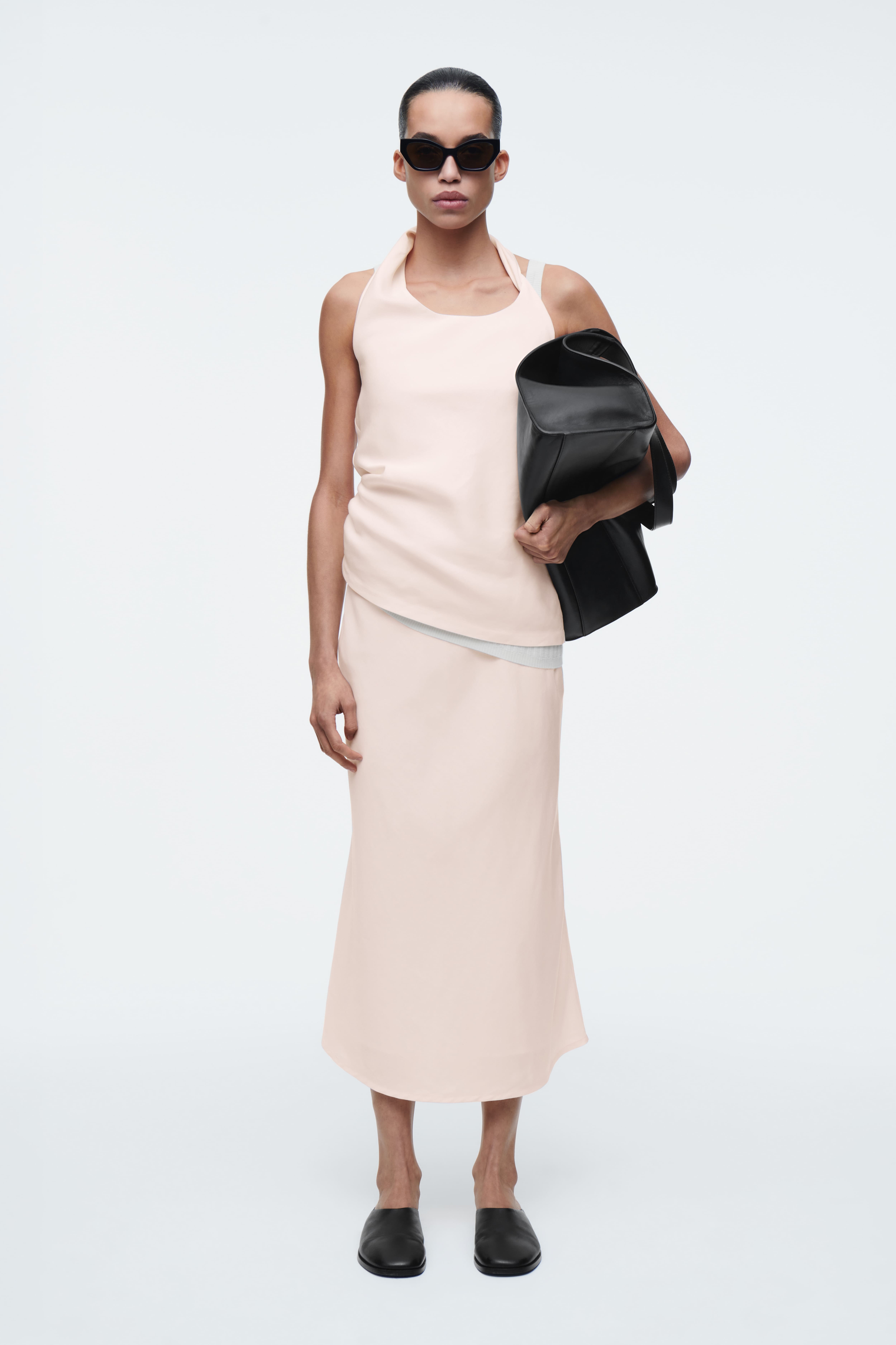 MIDIKJOL I LINNEBLANDNING - LJUSROSA/SVART