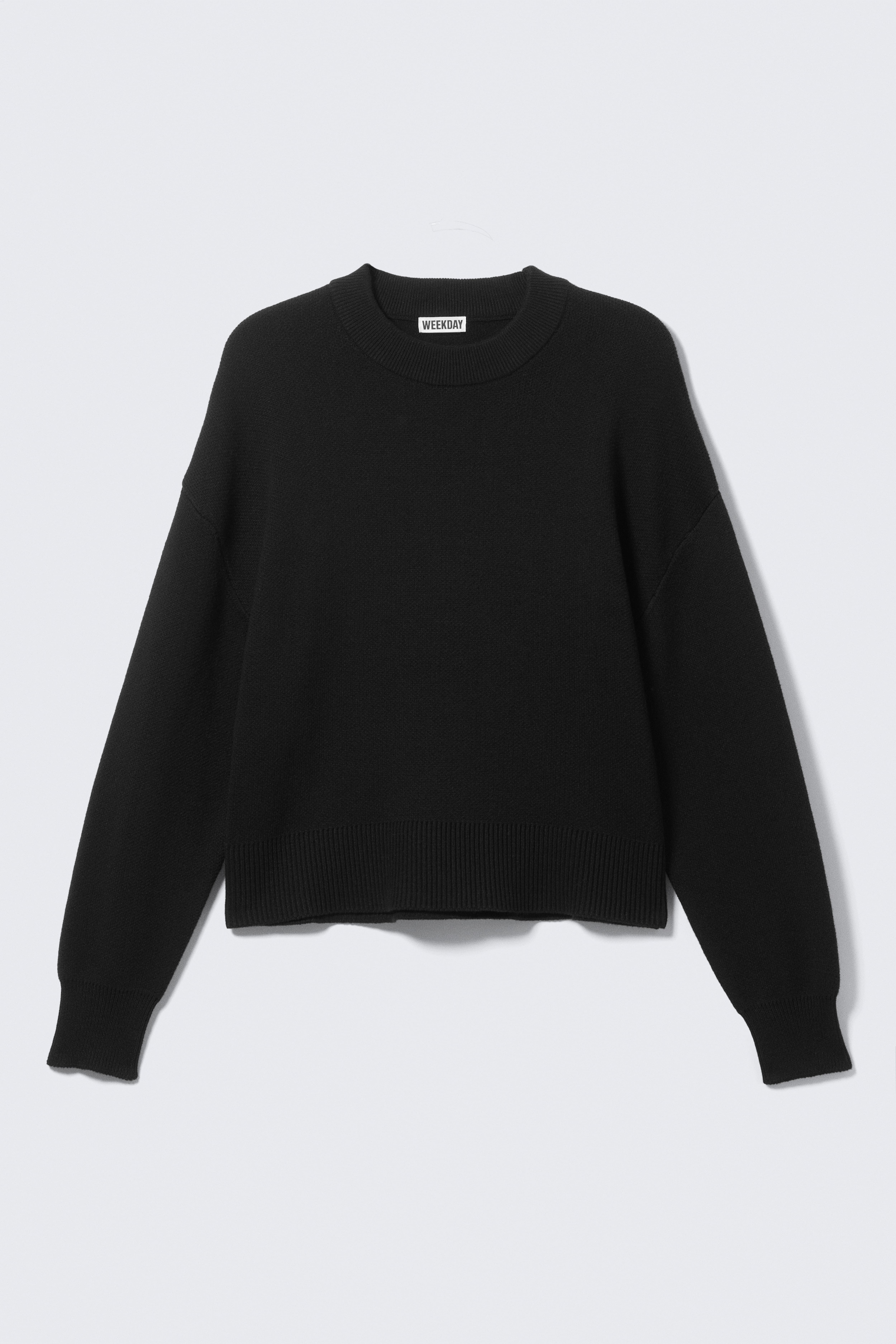 Avslappnad boxig stickad tröja - Svart/Beige