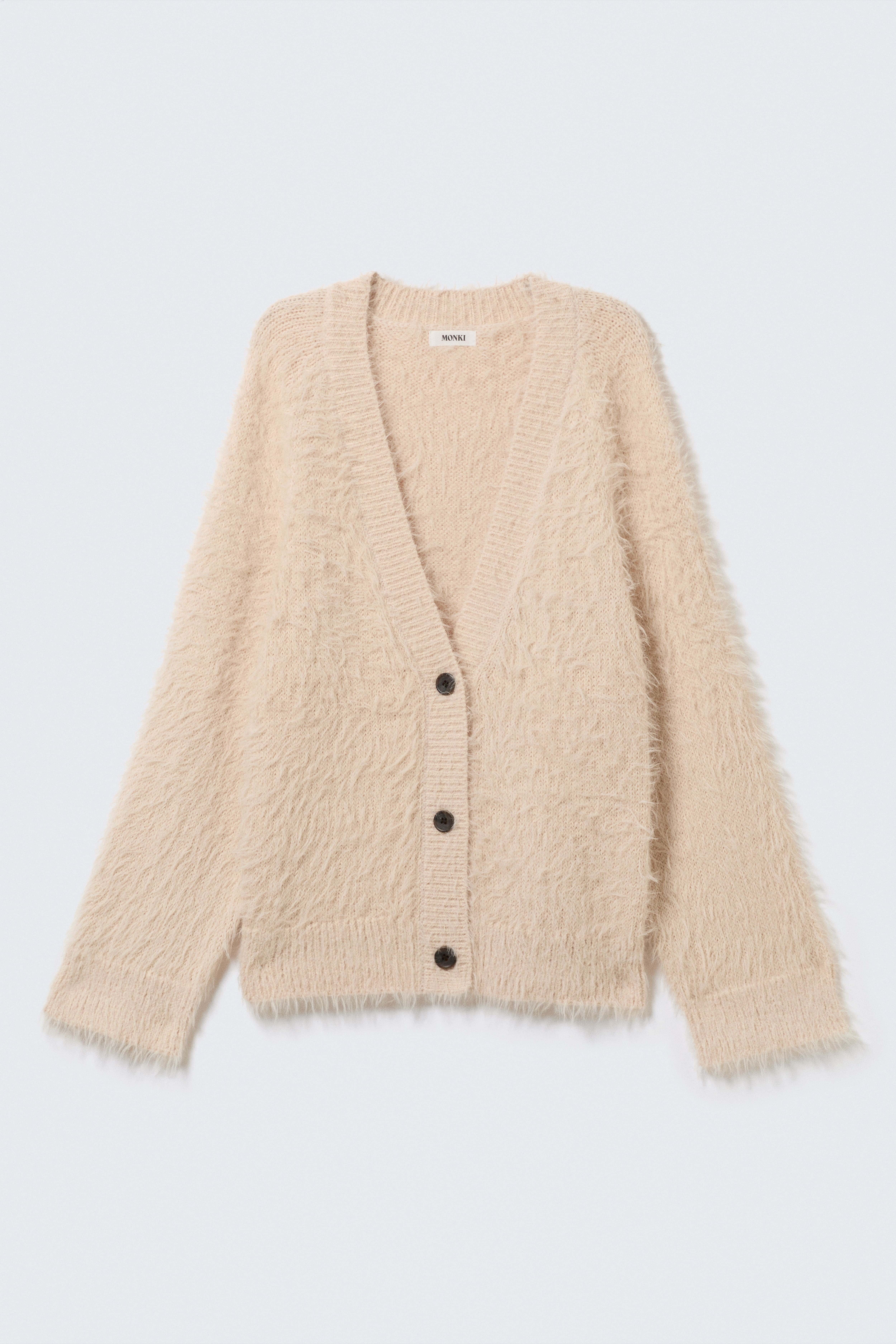 Oversized Strickjacke mit V-Ausschnitt - Beige/Dunkelbraunes Zebramuster