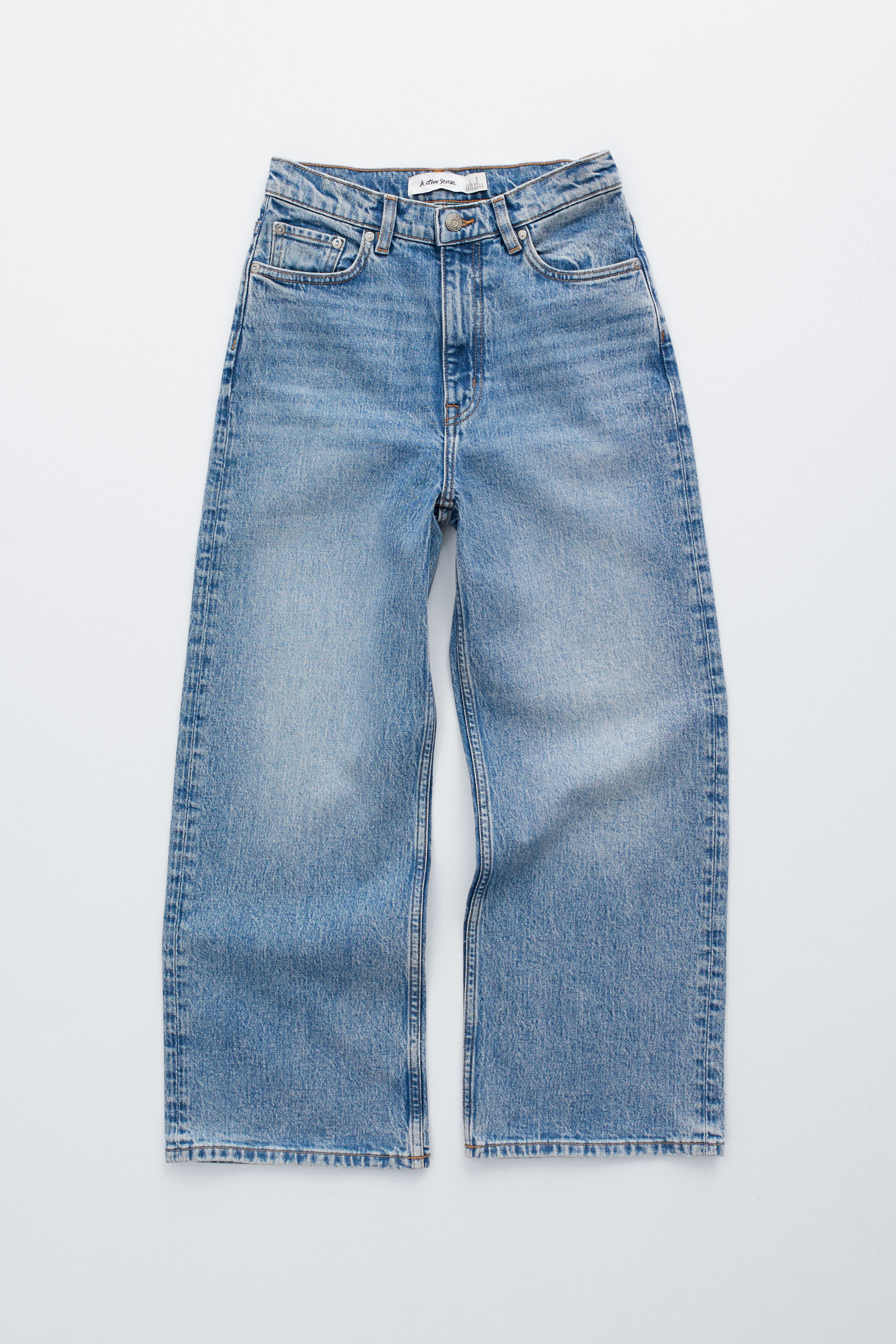 Verkürzte Jeans mit weitem Bein - Hellblau/Mittelblau/Schwarz