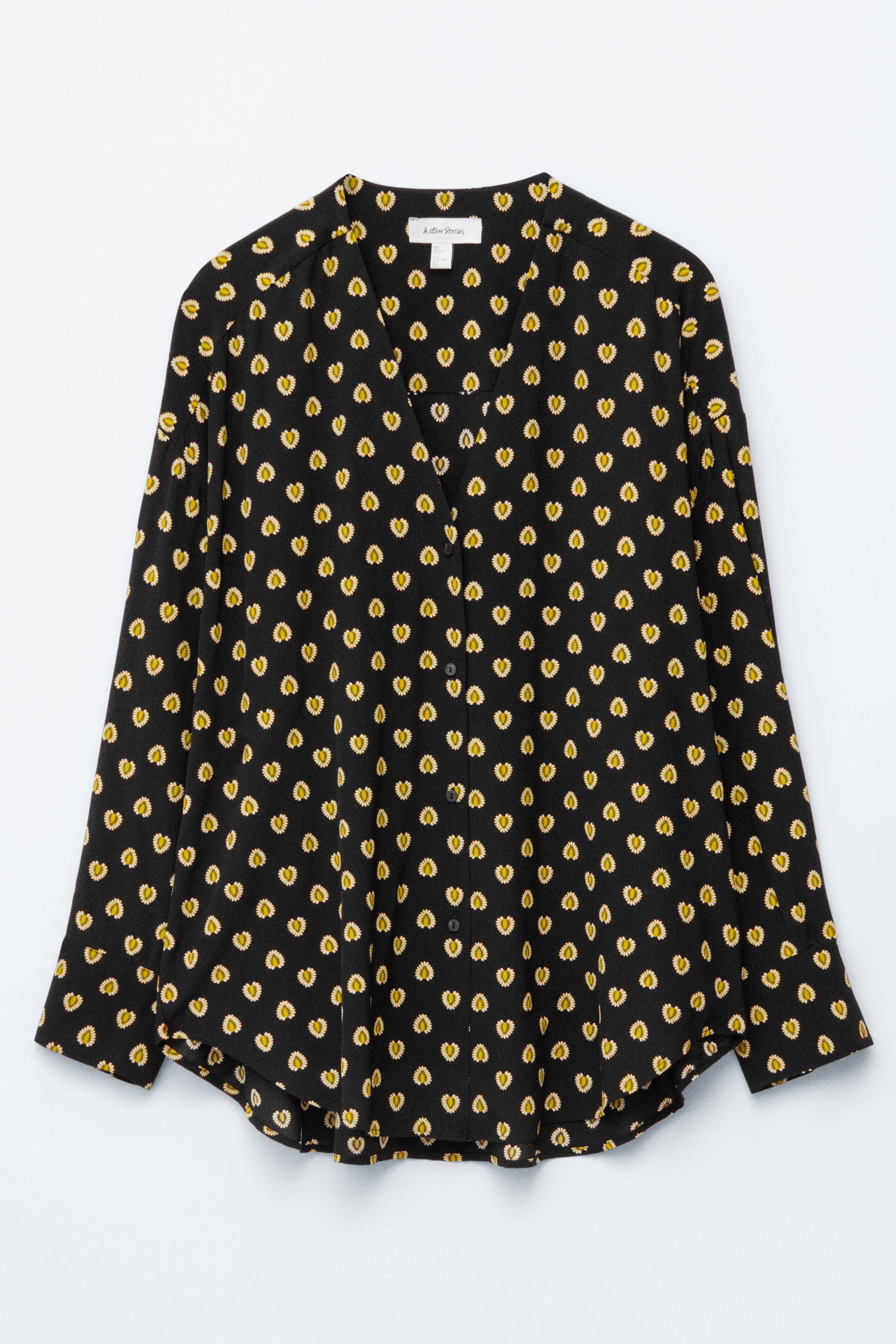 Oversized blus med V-ringning och tryck - Svart/gul mönster