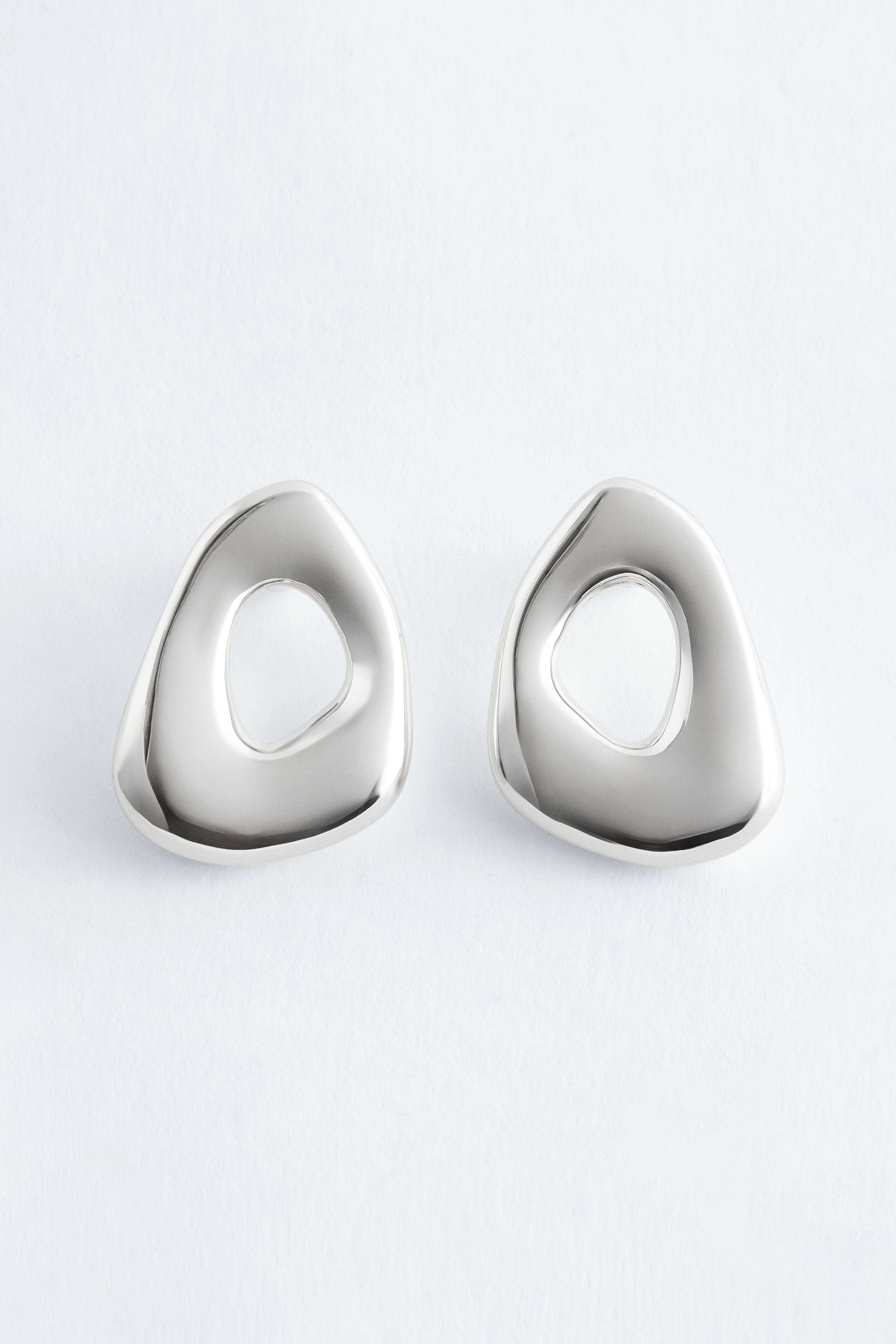 Markante skulpturierte Ohrringe - Silber