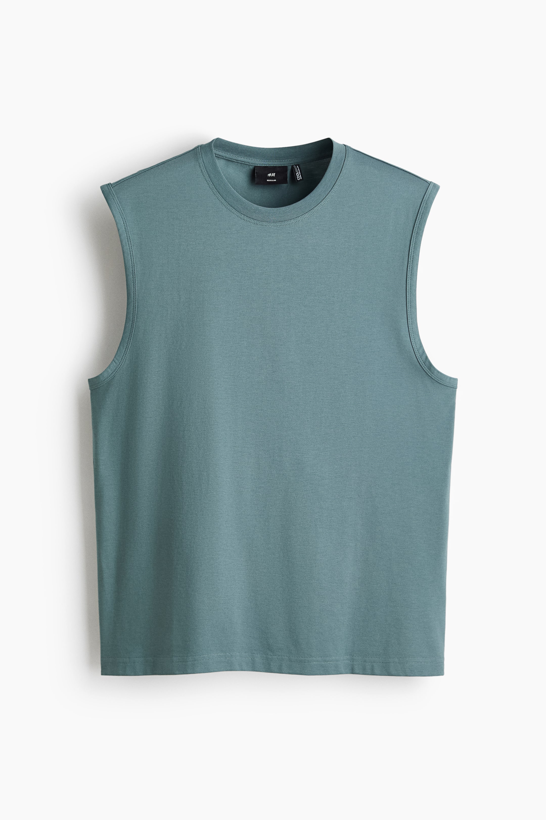 Voir une image plus grande: Un t-shirt sans manches de couleur sarcelle avec un col rond, des coutures d'épaules prononcées et un ourlet droit, avec une étiquette de marque noire visible à l'arrière du cou.