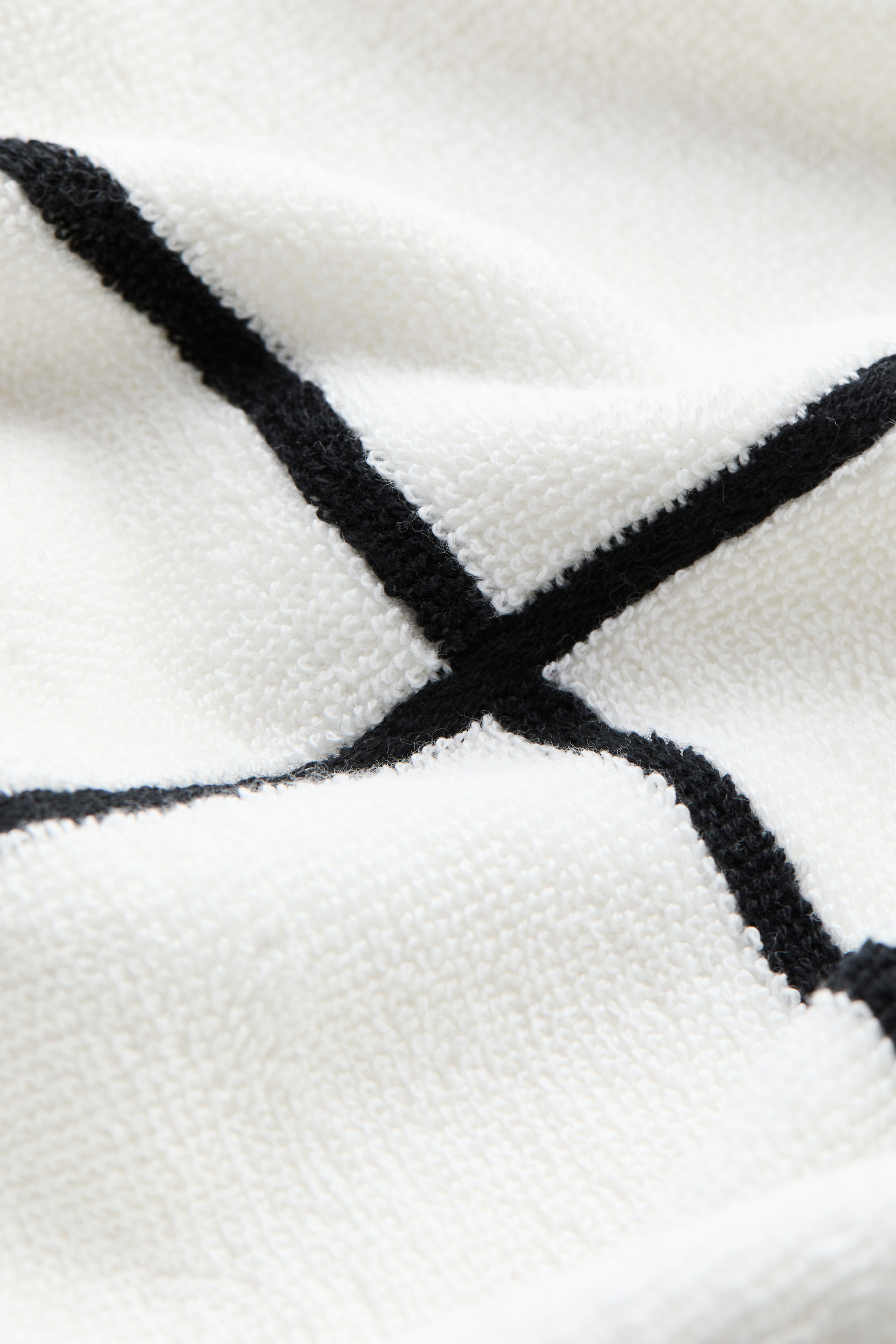 Serviette à motif quadrillé