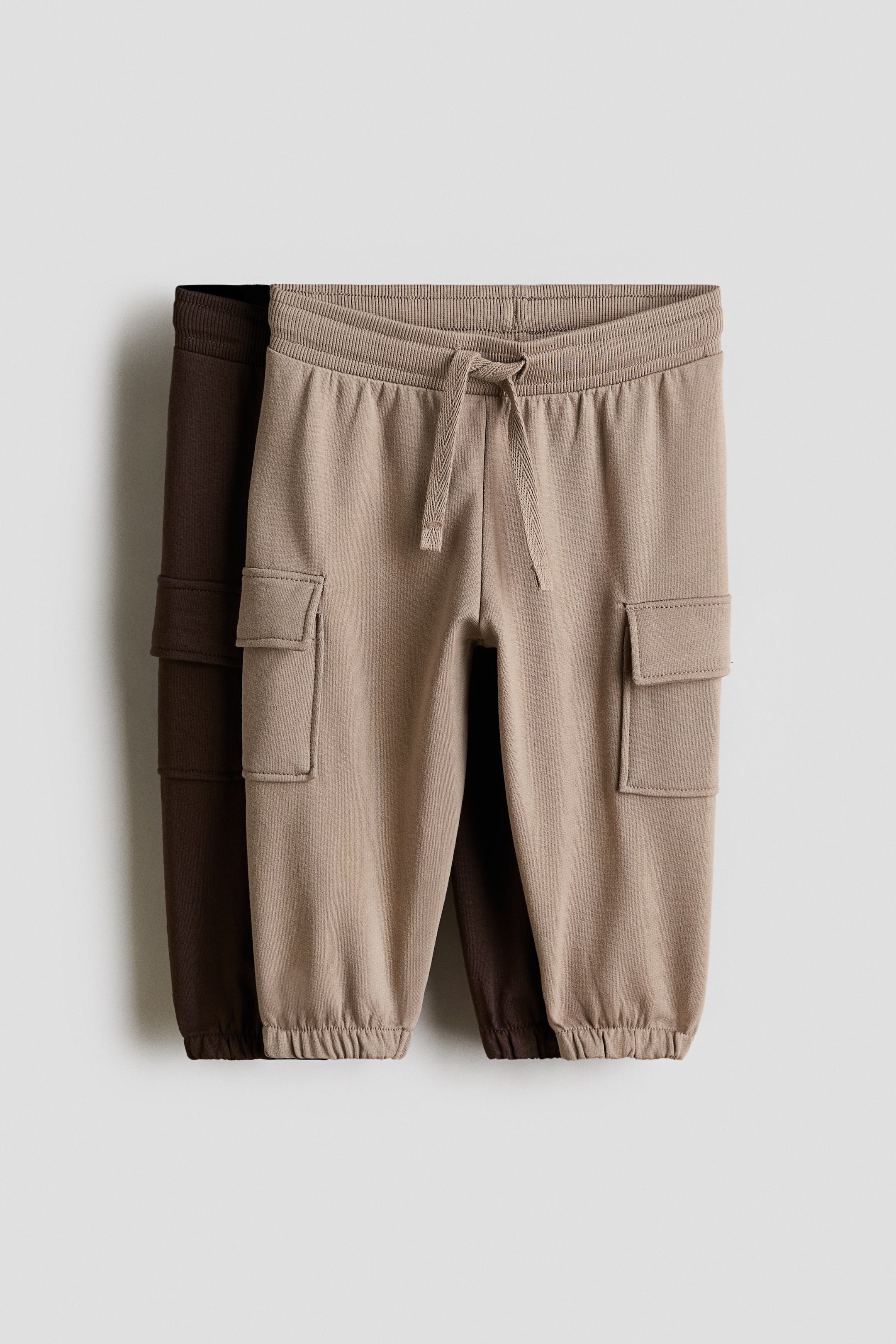 View larger image: 2-pack Cargo Joggers - Beige/dark brown - Kids | H&M PH 1