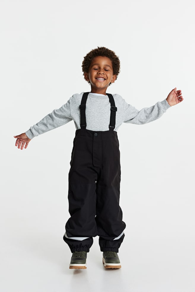 Outdoorowe spodnie rosnące z dzieckiem - Czarny/Czarny/Bloki kolorów - 3