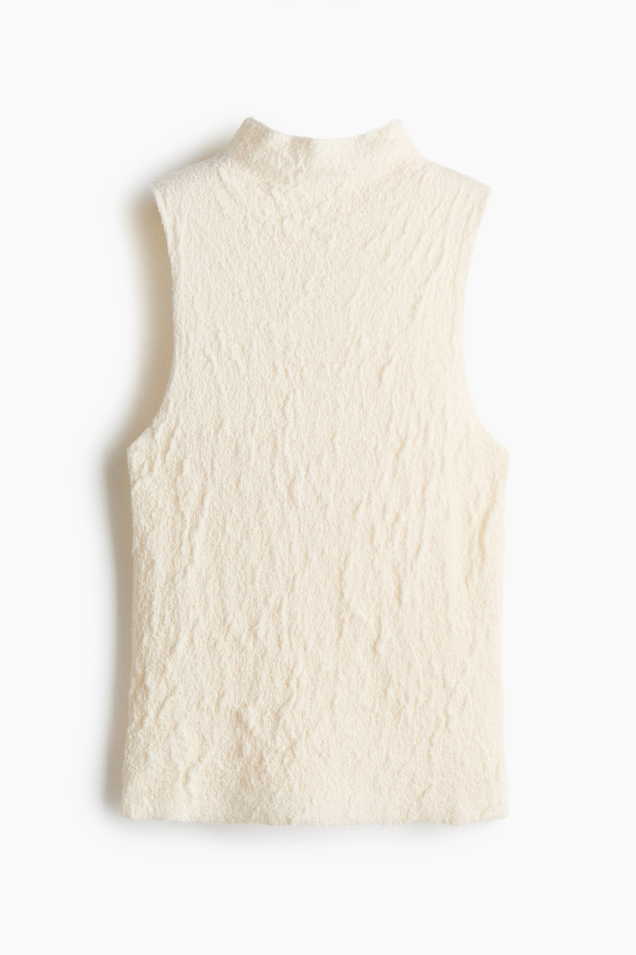 View larger image: A cream sleeveless top is showcasing its front, featuring a mock neck and a visibly textured, crinkled fabric.