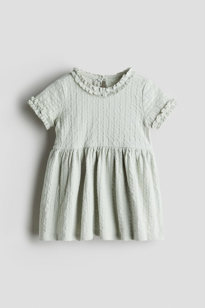 Robe à volant en jersey jacquard - Vert ancien clair/Beige clair/fleuri/Marron clair - 1