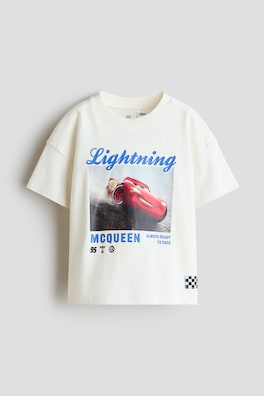Oversized T-shirt med tryckt motiv