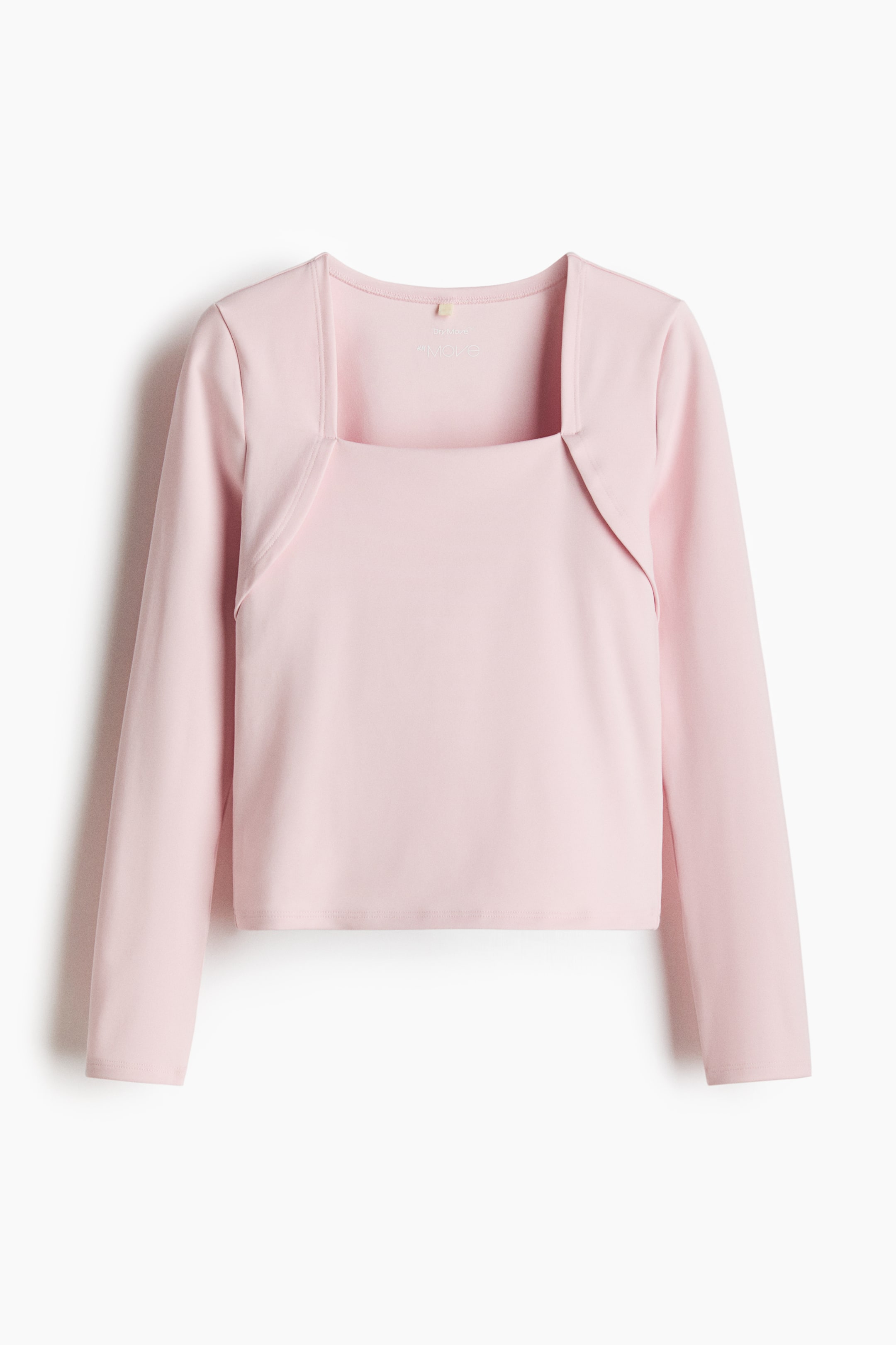 Ampliar la imagen: Blusa deportiva de manga larga con DryMove? está presentando su vista frontal. Está diseñada en un color rosa claro, con un escote cuadrado que revela un cuello interior redondeado, mangas largas y un dobladillo corto.