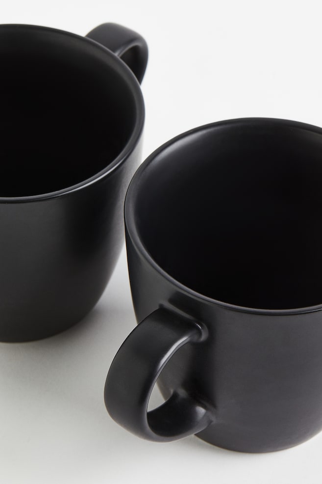 2-pack porcelain mugs - Black/Light beige/Green - 3