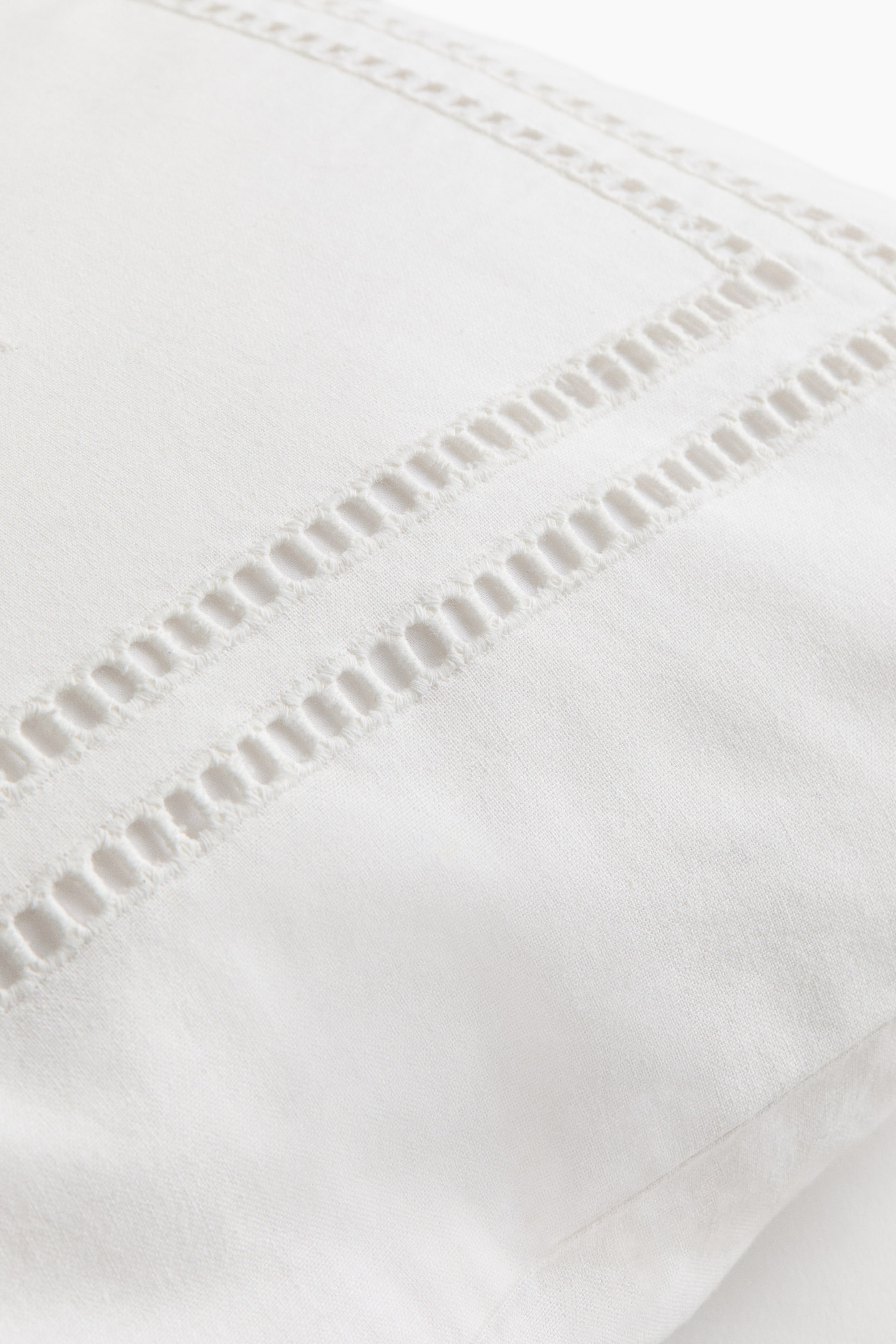 Eyelet-Embroidered Cushion Cover