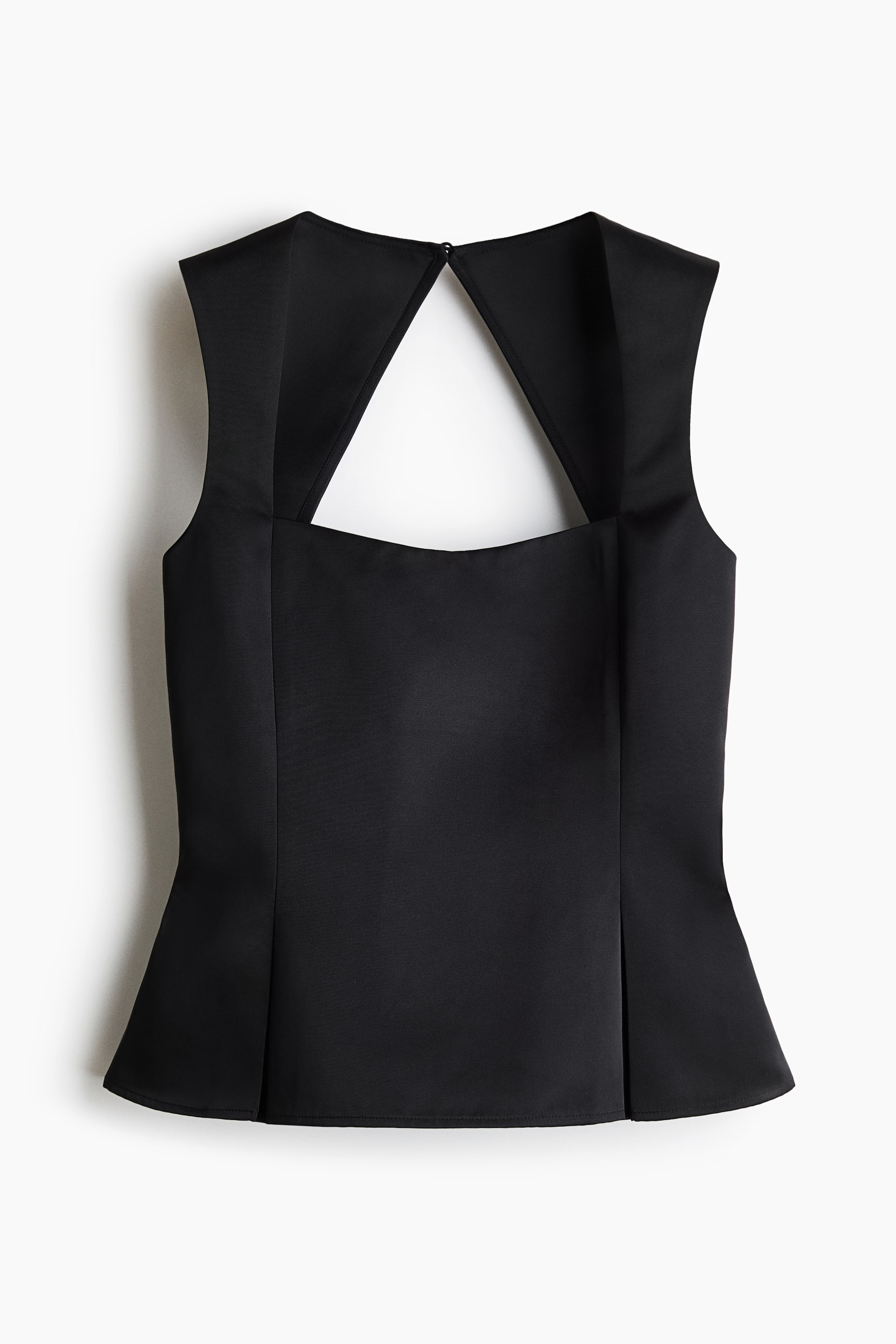 Haut péplum avec dos ouvert