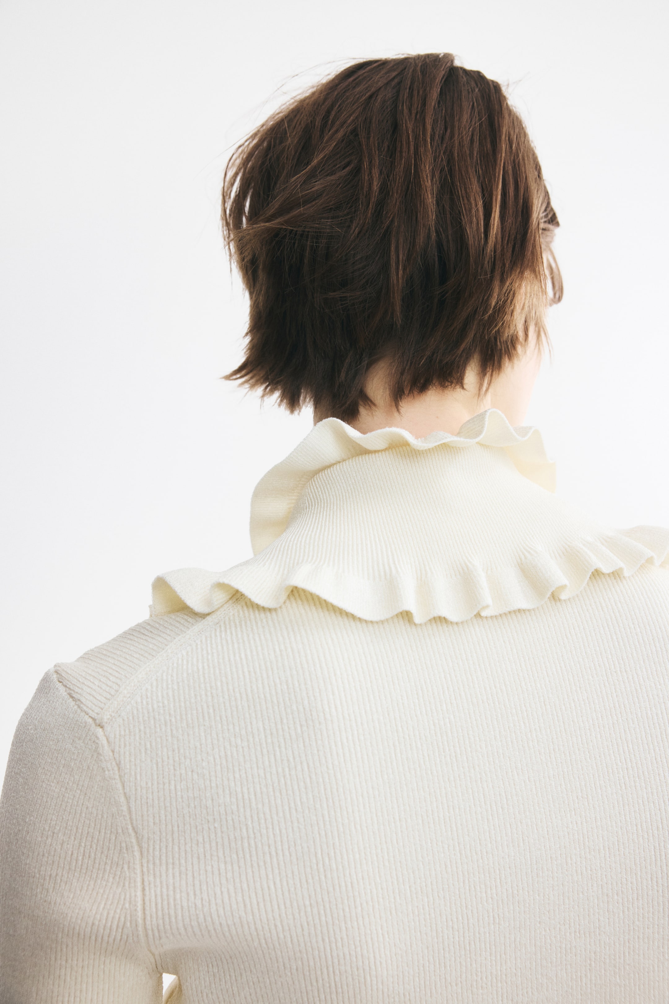 Ruffle-Trimmed Rib-Knit Top