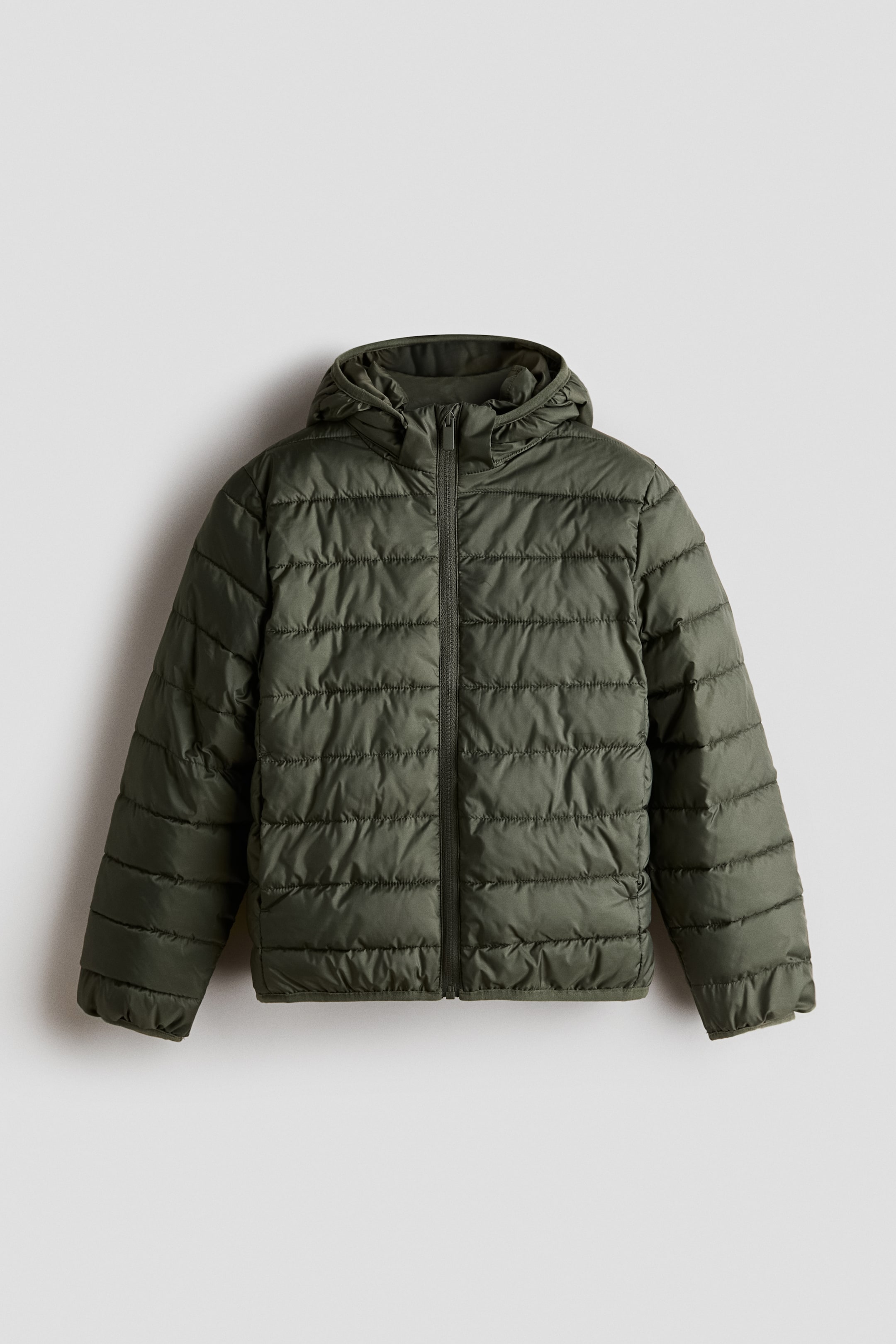 View larger image: An olive green hooded puffer jacket is shown from the front, featuring horizontal quilting across the body and sleeves. It has a full-length centre-front zipper and elasticised finishes at the cuffs and hem.