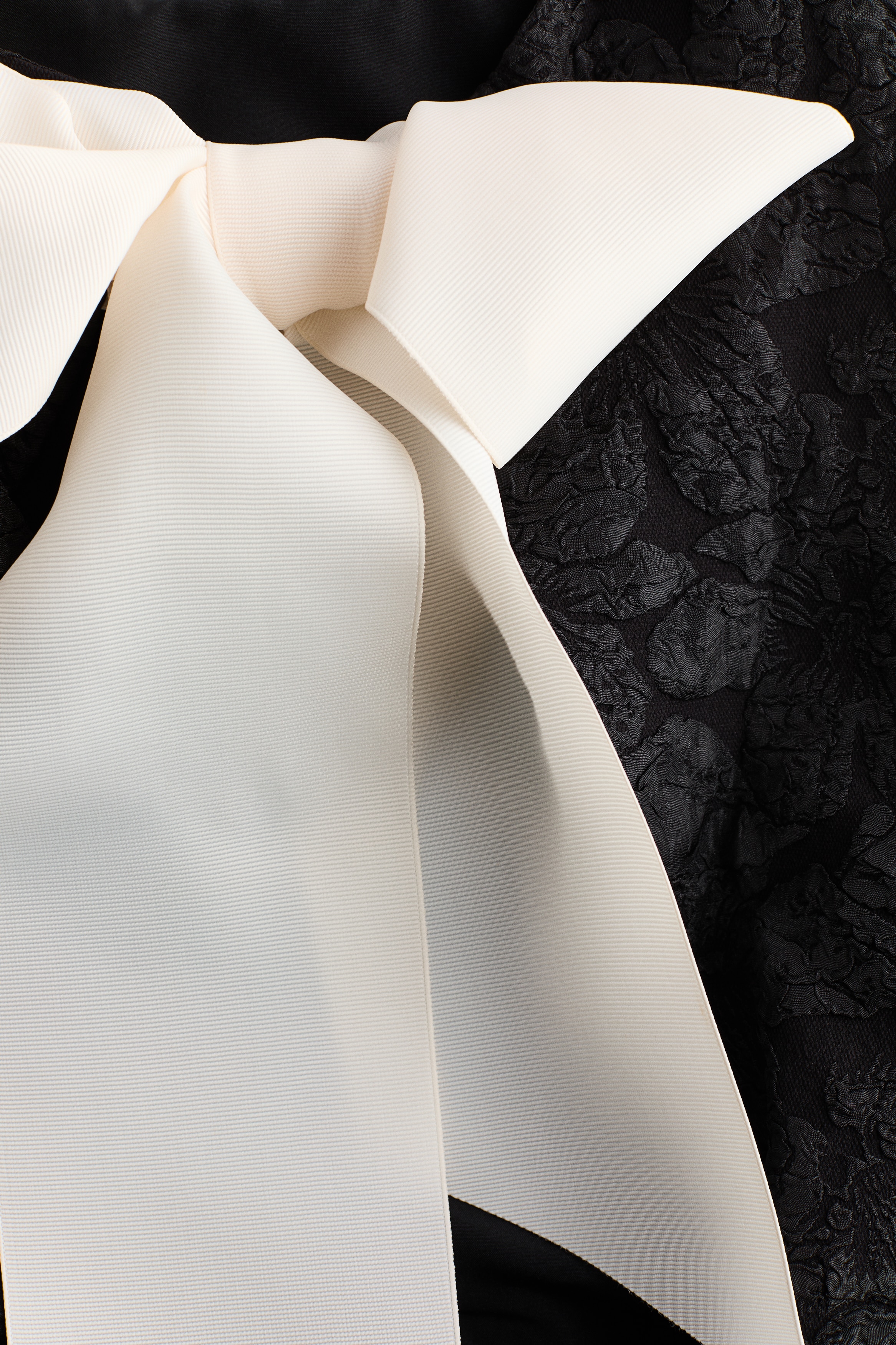 Bow-detail peplum top