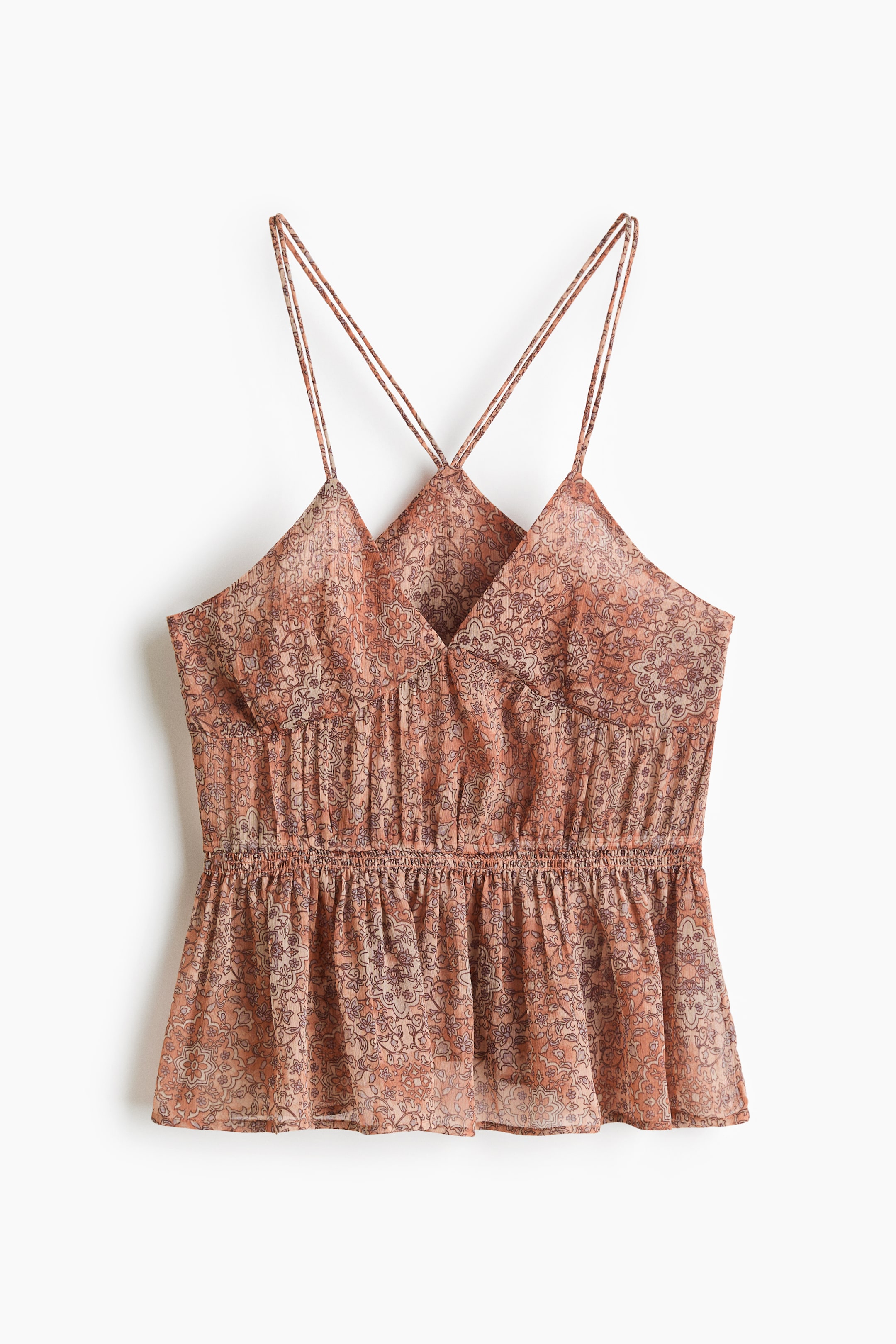 Ver imagem maior: Top cami em tom pêssego, semi-transparente, com padrão floral escuro e paisley, apresenta duplas alças spaghetti, decote em V com sobreposição no busto e cintura elástica franzida que se alarga numa bainha peplum.