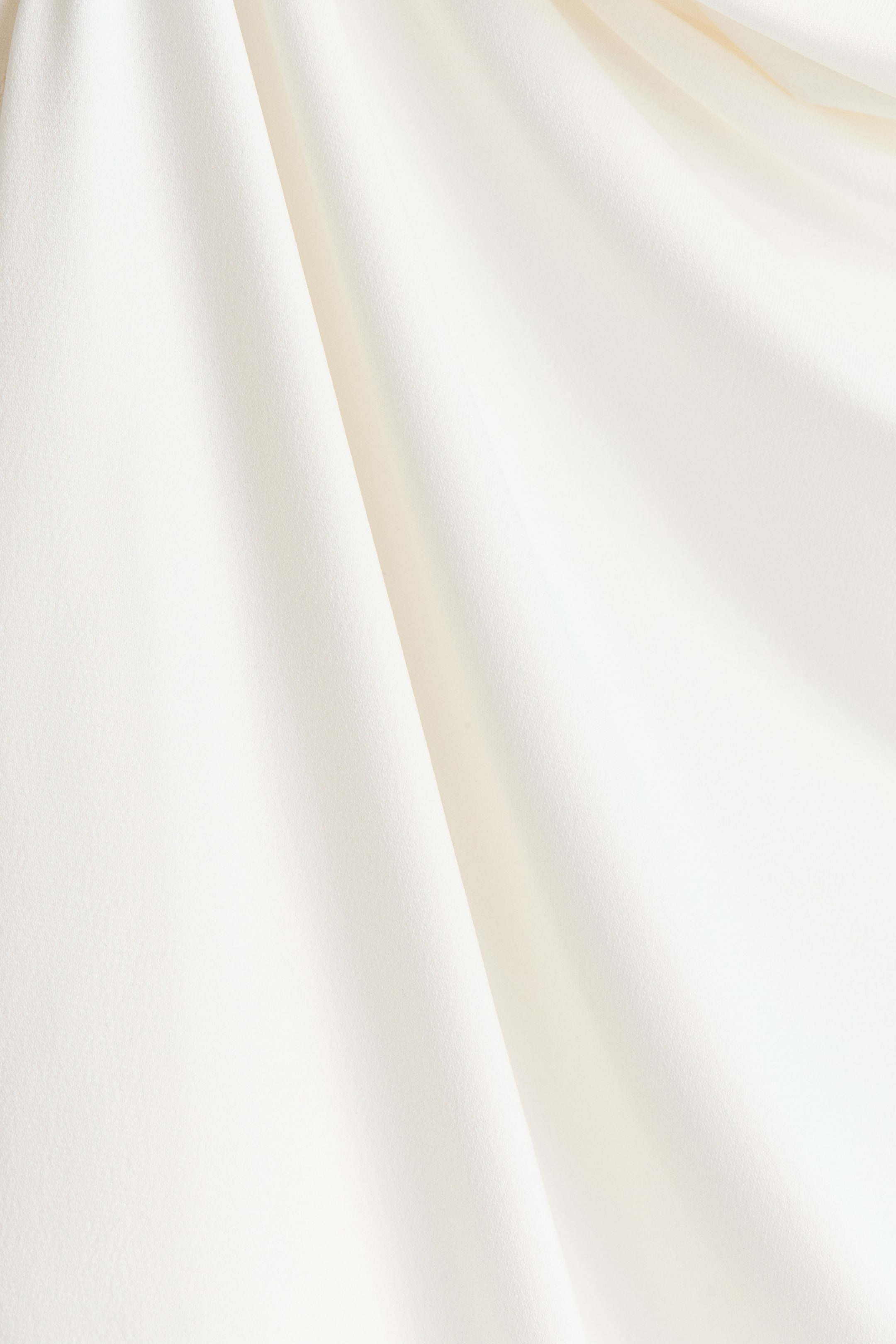 Haut asymétrique à effet drapé