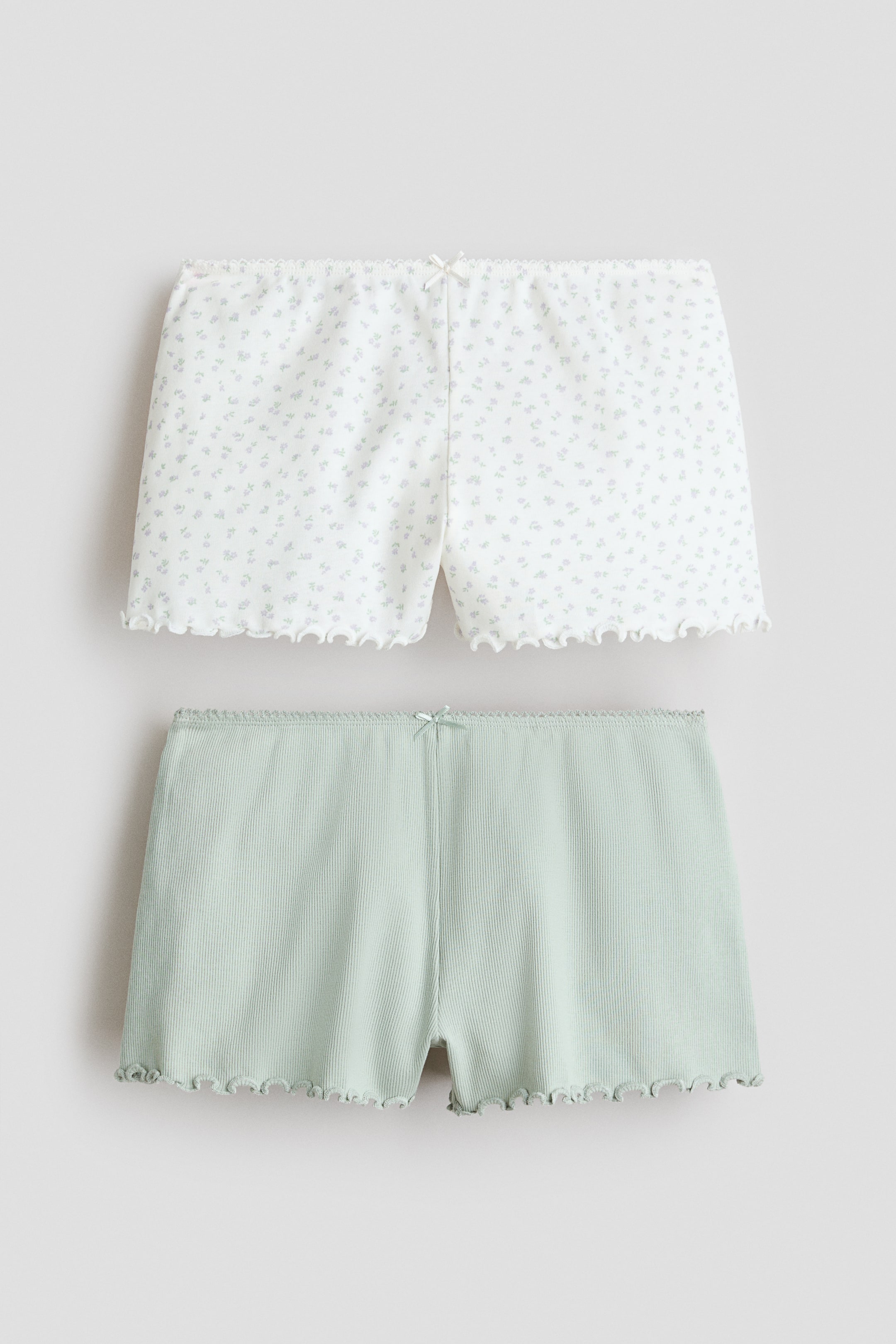 View larger image: 2-pack overlocked cotton shorts - White/Floral - Kids | H&M 1