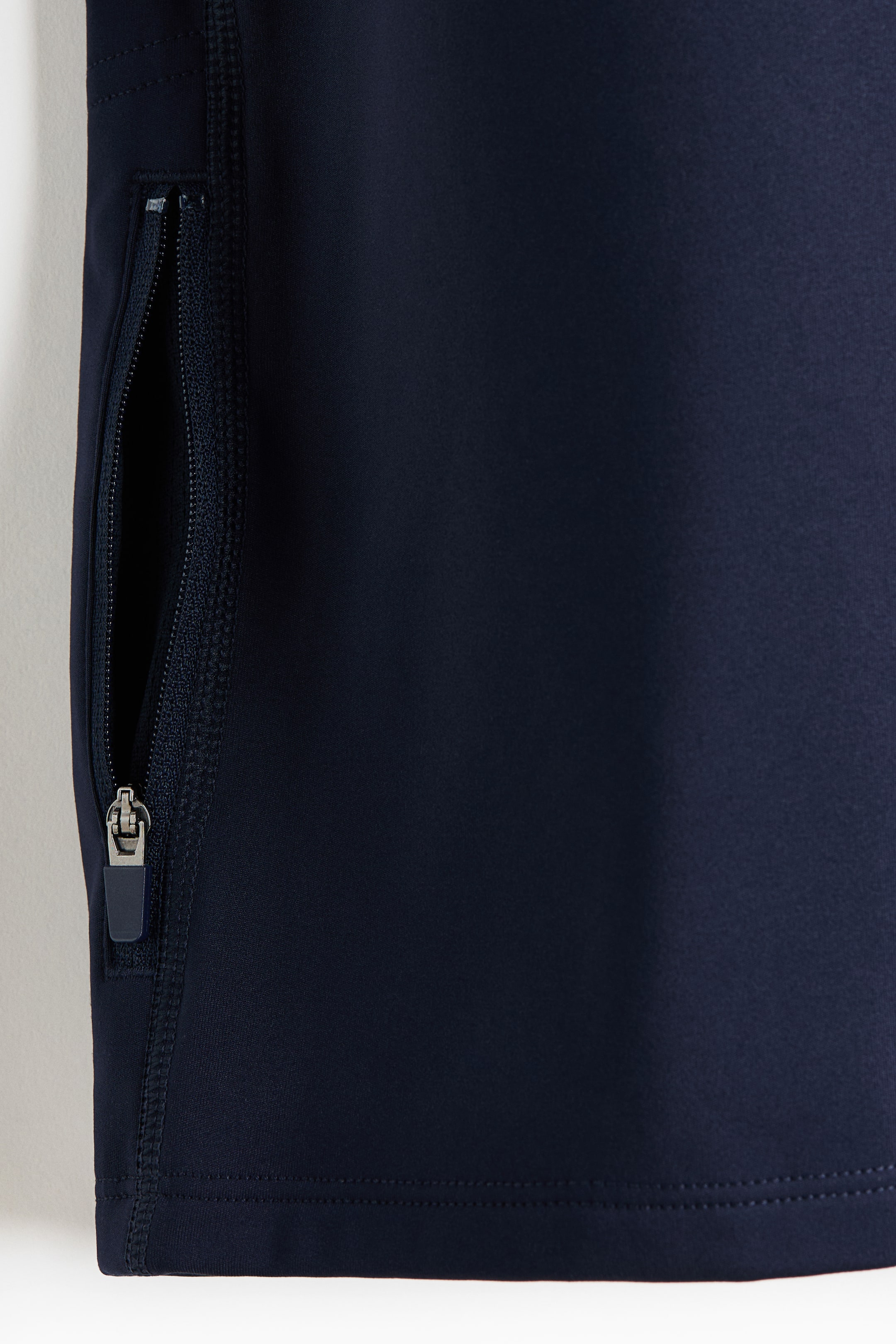 View larger image: Warming zip-top sports top with ThermoMove™ - Dark navy blue/Move Zlatan - Men | H&M IN 9