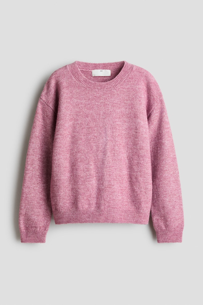 A pink heathered sweater is facing forward, featuring a ribbed crew neck, long set-in sleeves ending in ribbed cuffs, and a ribbed hem. - 1