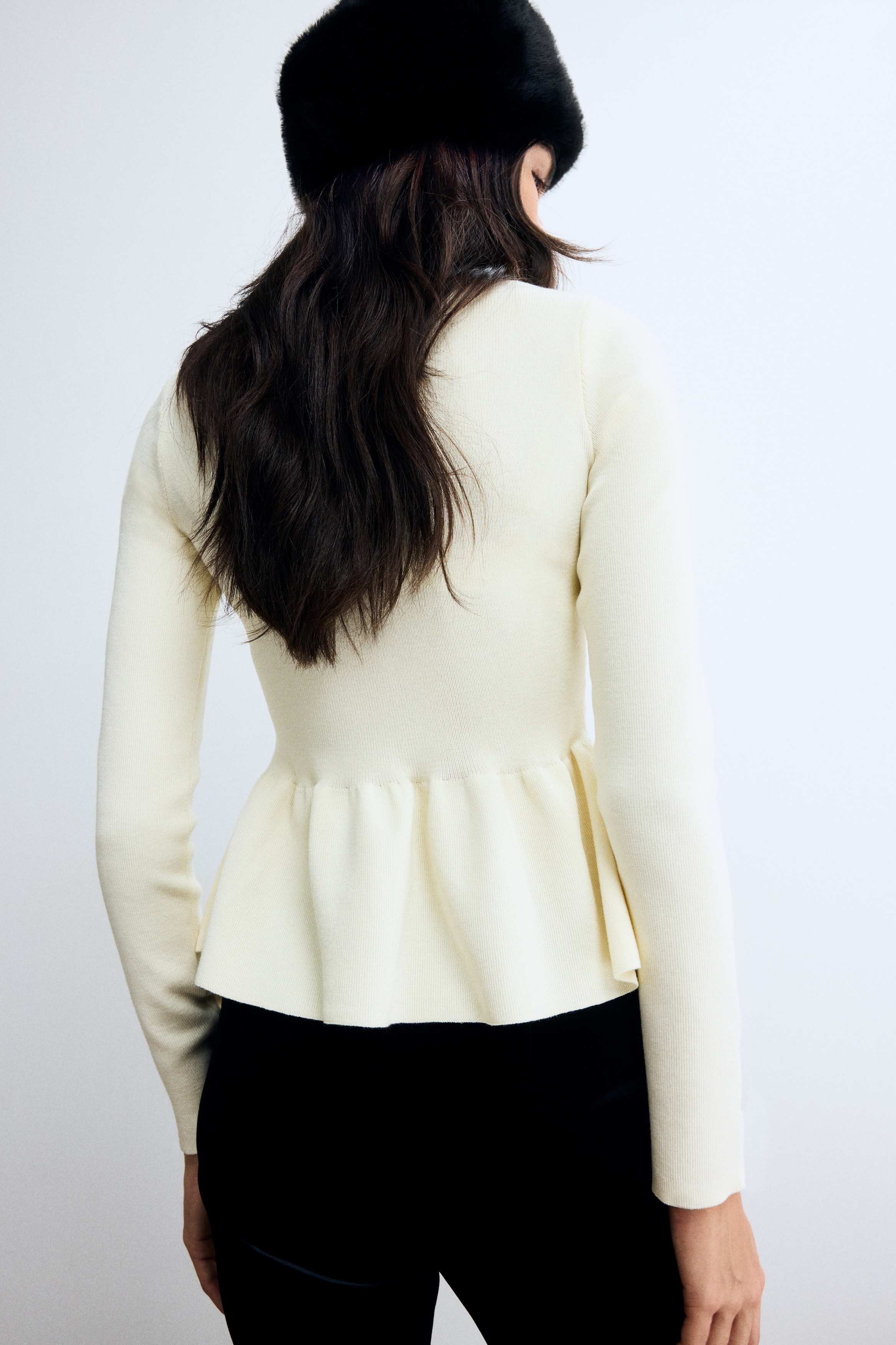 Knitted peplum top