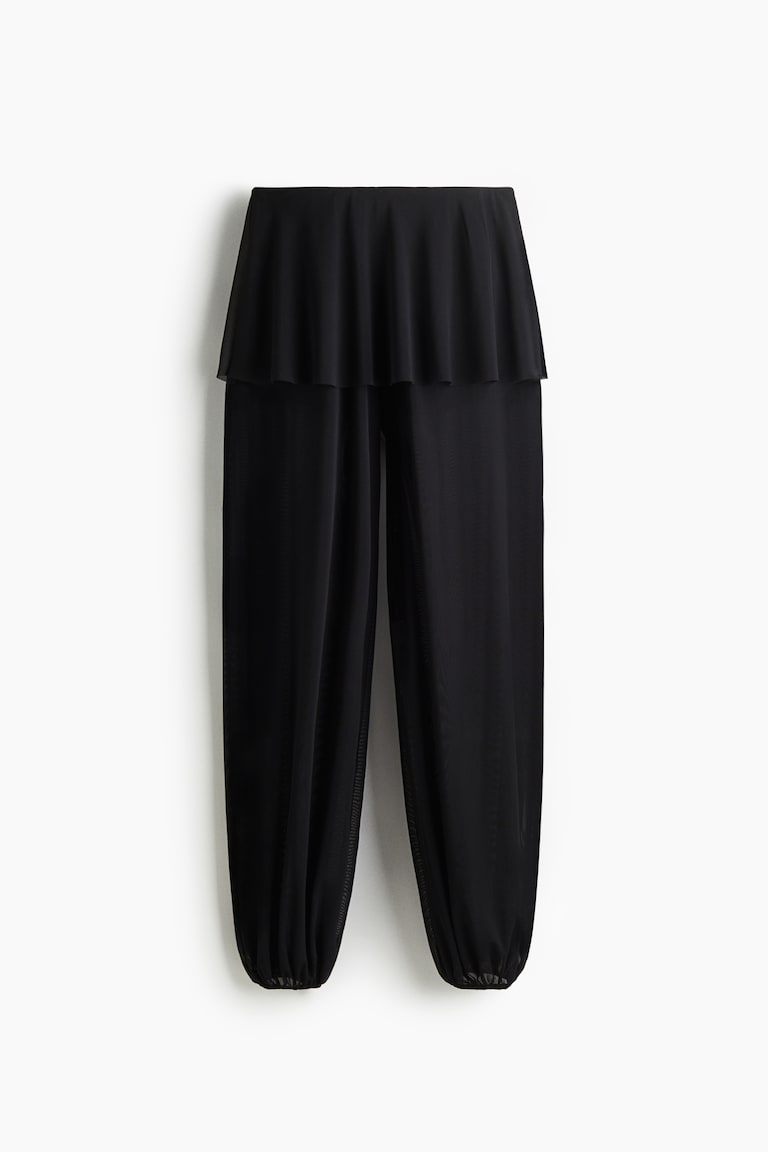 Mrežaste pantalone sa suknjom