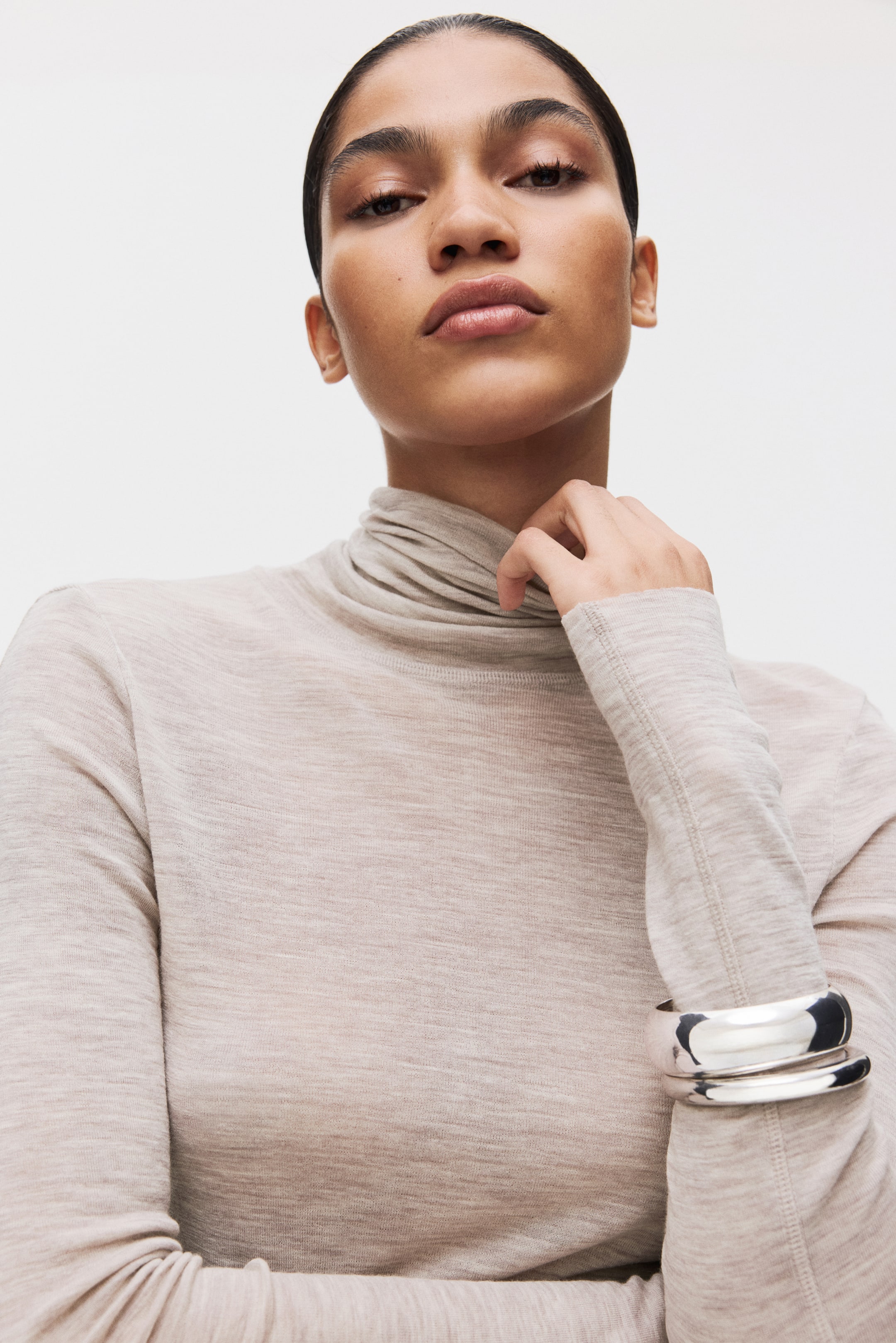 Ver imagen más grande: Top de lana con cuello alto - Beige grisáceo claro jaspeado - MUJER | H&M ES 1