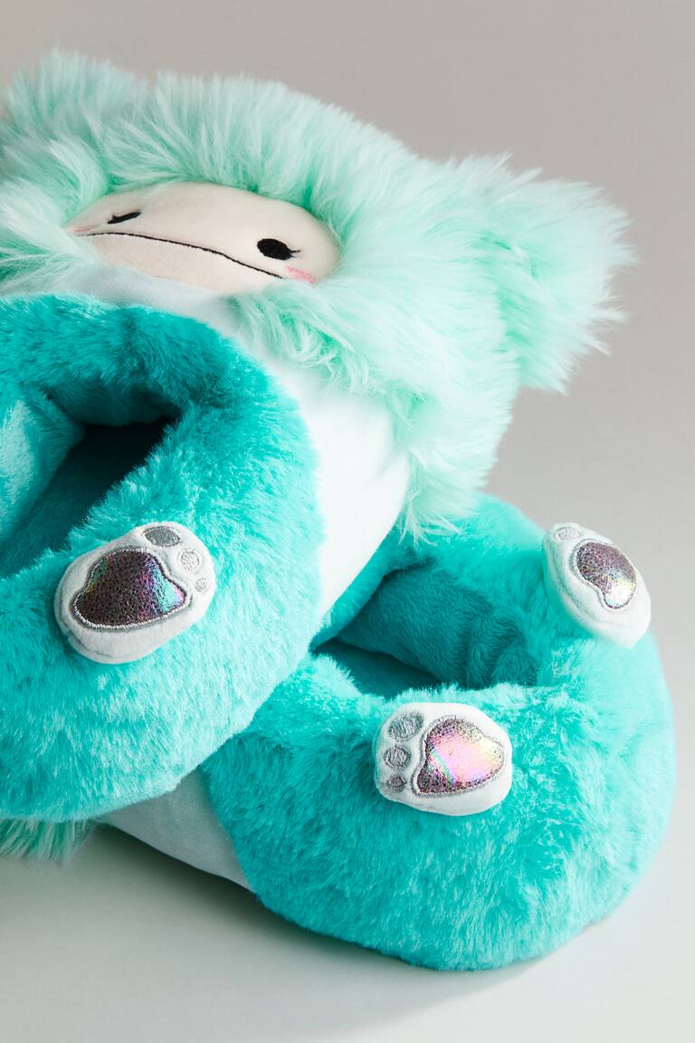 Pantuflas suaves con aplicaciones