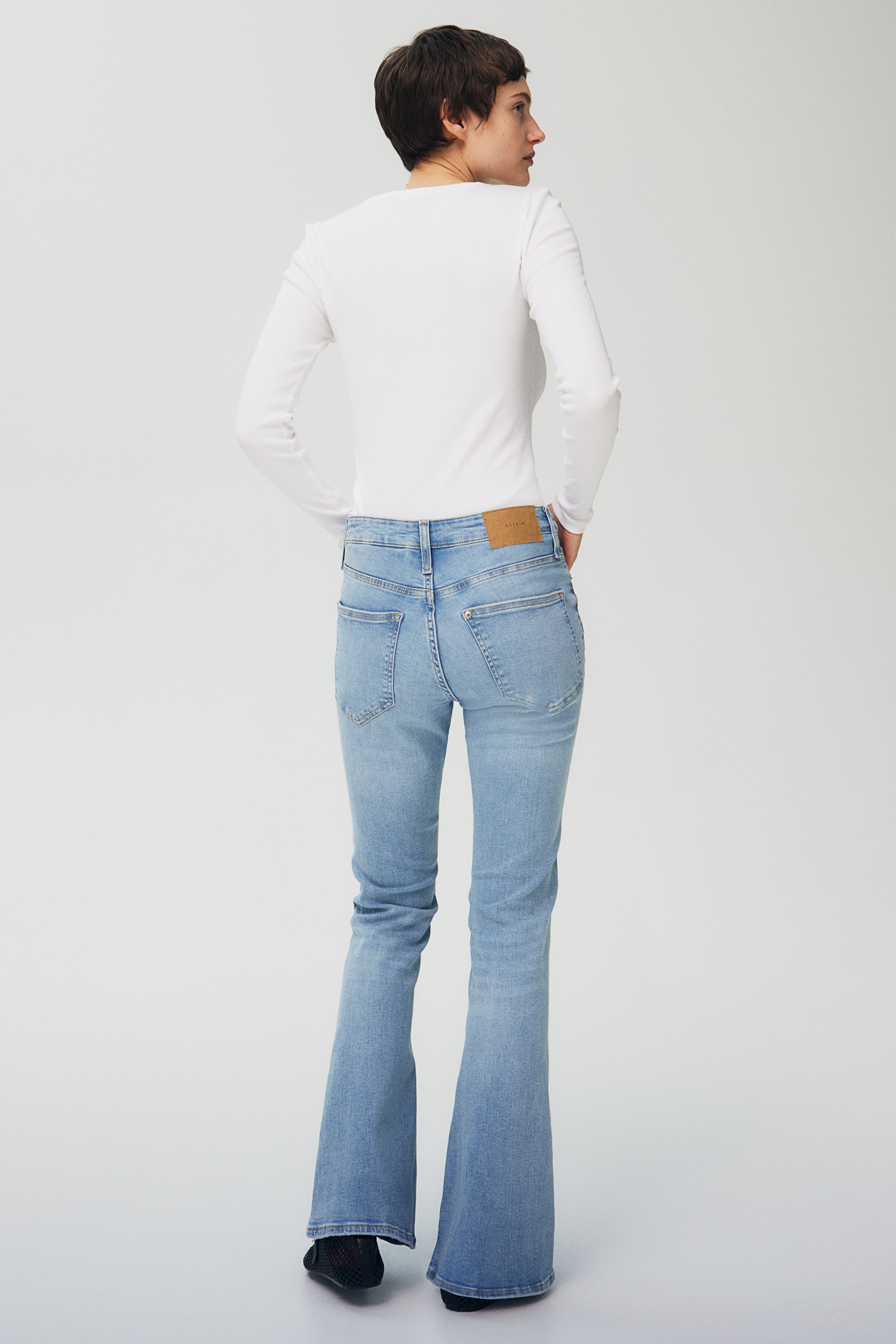 Flared Ultra High Jeans - Ultra high waist - Long - Light denim blue ...