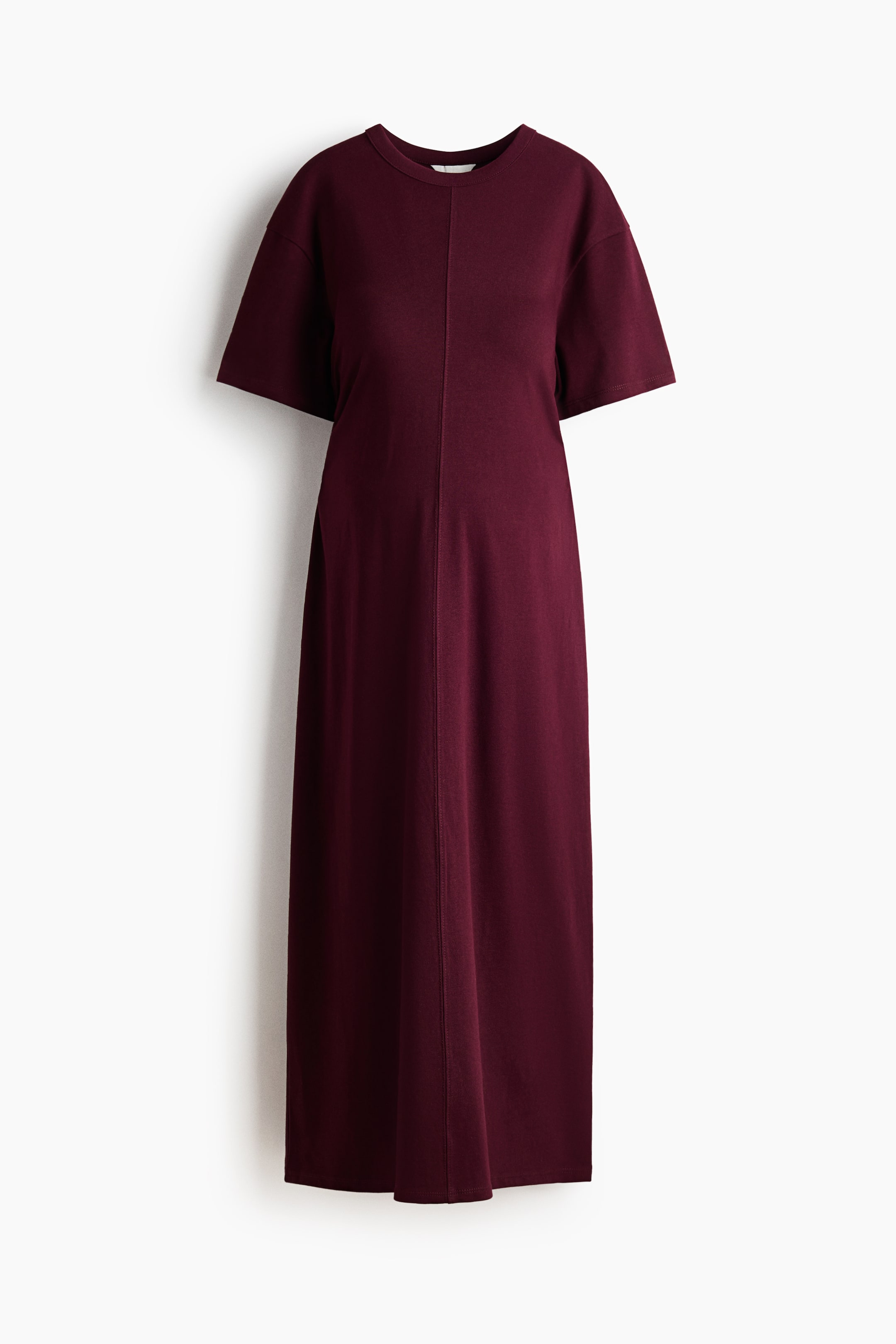 View larger image: "A maroon maxi dress features a crew neck and short, wide sleeves, with a distinct vertical seam running down its front."