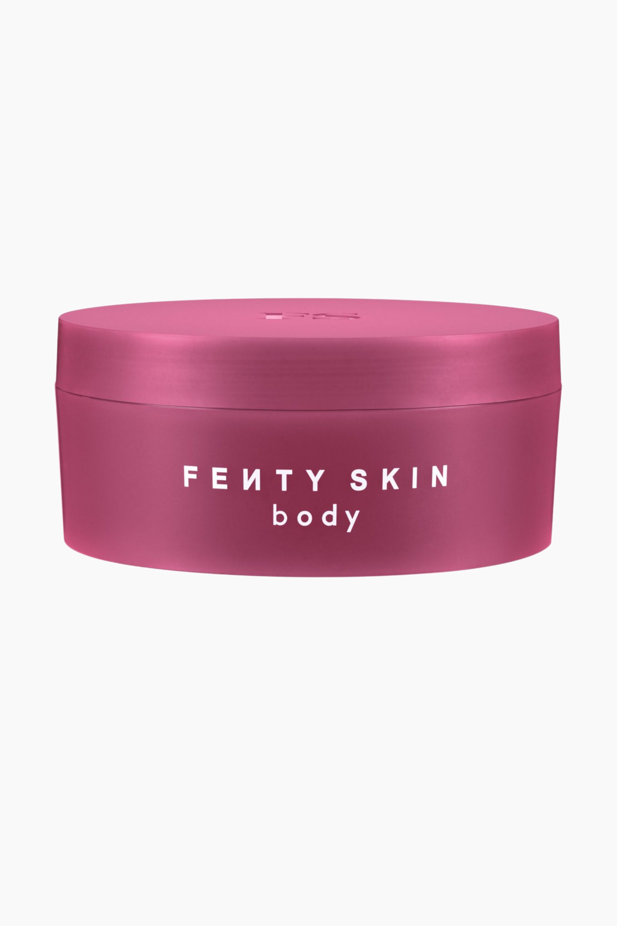 Visa större bild: Butta Drop Whipped Oil Body Cream står upprätt i en cylindrisk, matt magentafärgad burk med ett matchande platt lock. På burkens framsida visas den vita texten ”FENTY SKIN body” i ett rent, sans-serif-typsnitt.