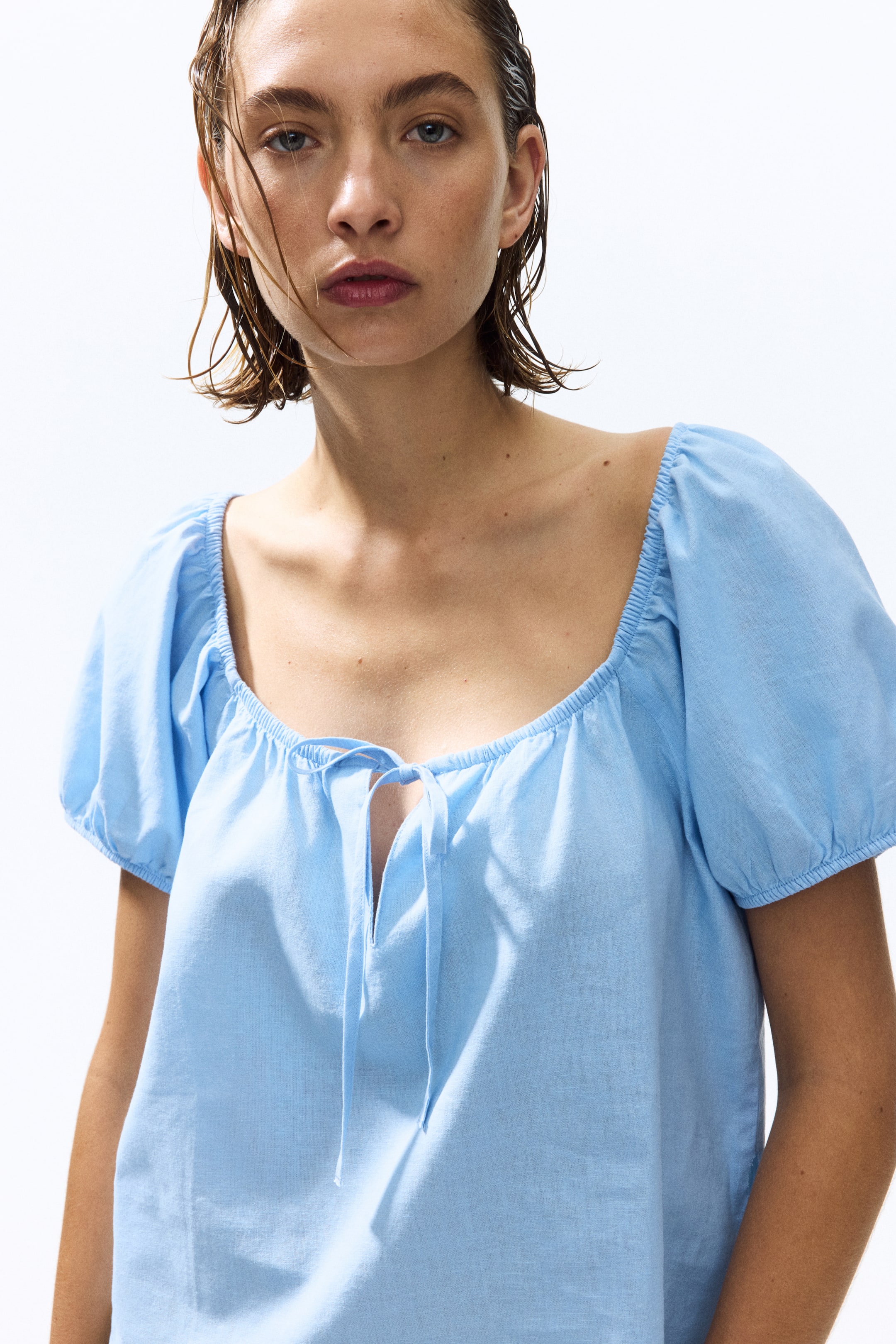 View larger image: Puff-sleeved linen-blend blouse - Light blue - Ladies | H&M 1