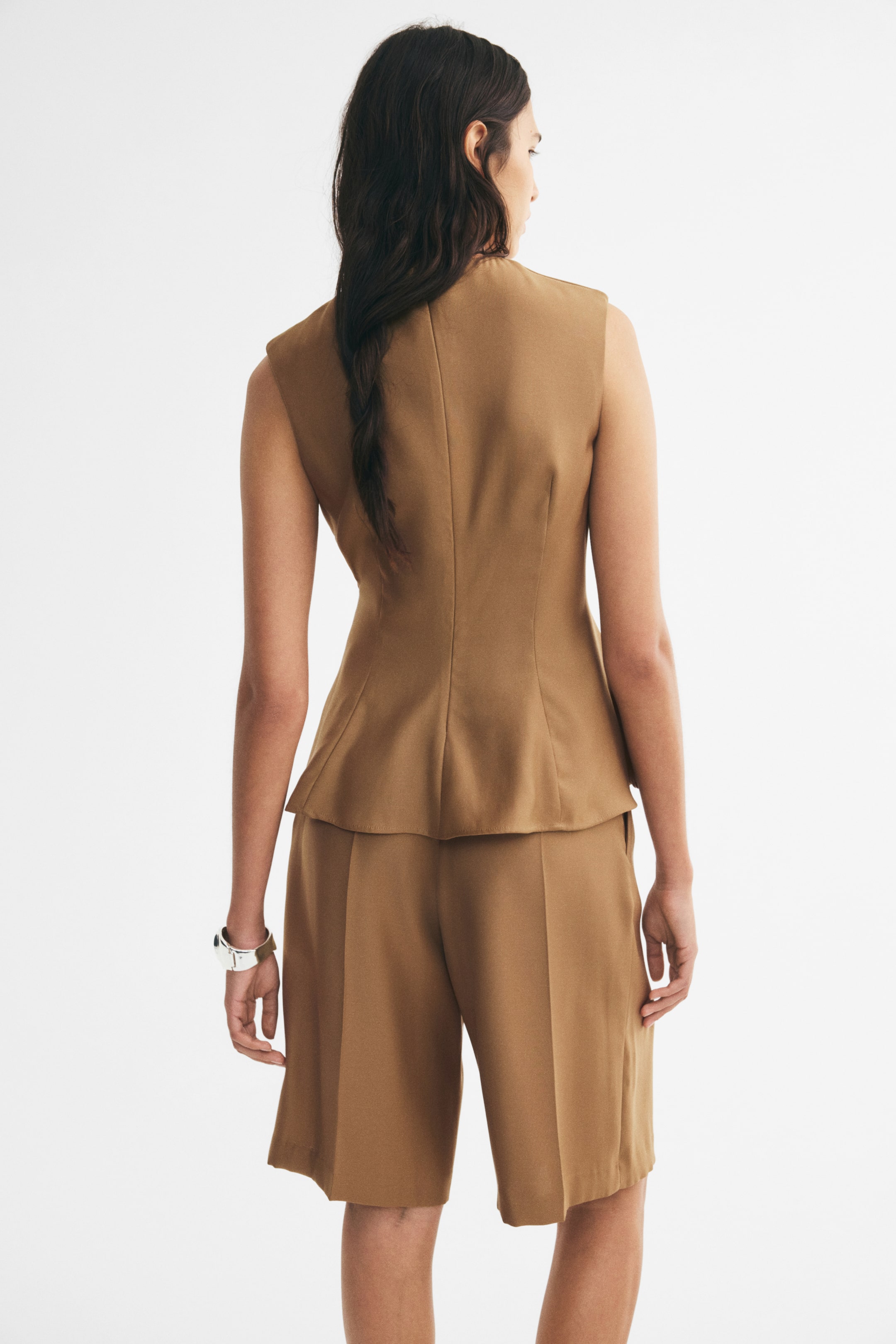 Sleeveless Peplum Top