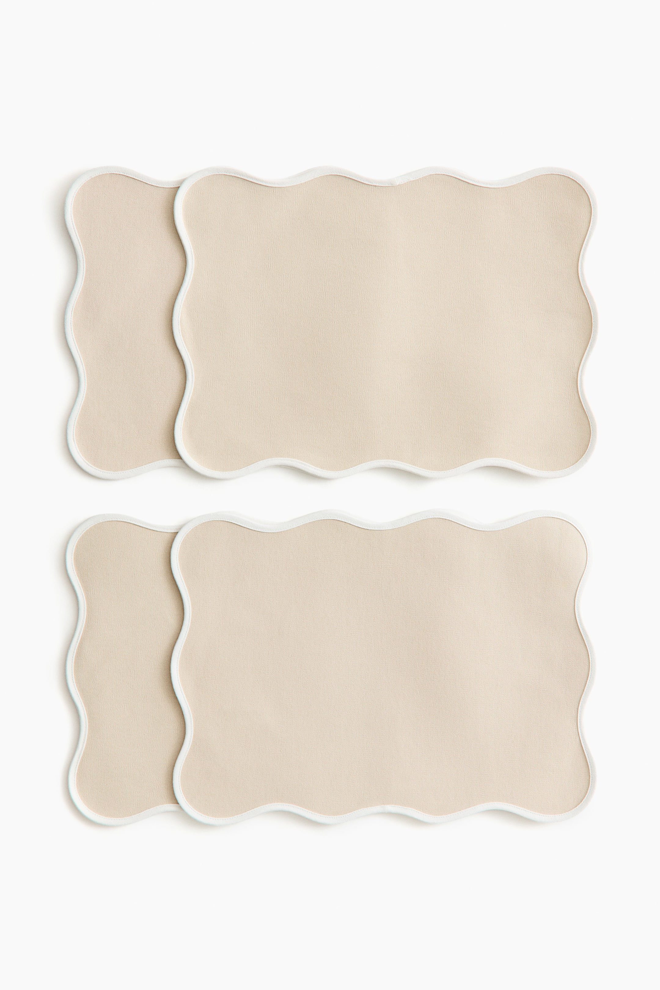 View larger image: 4-pack water-repellent place mats - Light beige/white - Home All | H&M US 1