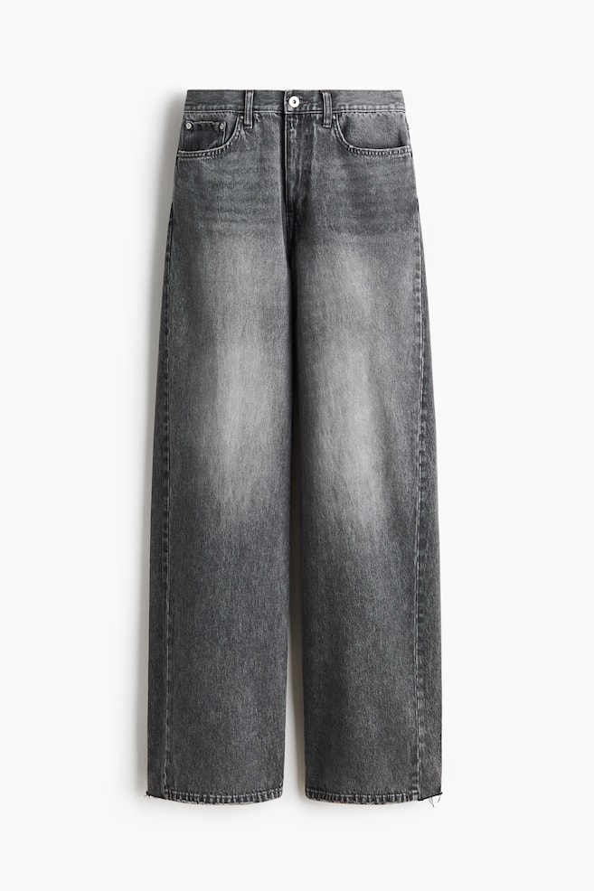 A pair of 5-pocket jeans is showcased in a front view, crafted from washed dark grey denim with noticeable fading on the thighs. They feature a regular waist with a zip fly and button closure, and a straight leg that is loose from the thigh to the hem, reaching a regular length at the top of the foot. - 1
