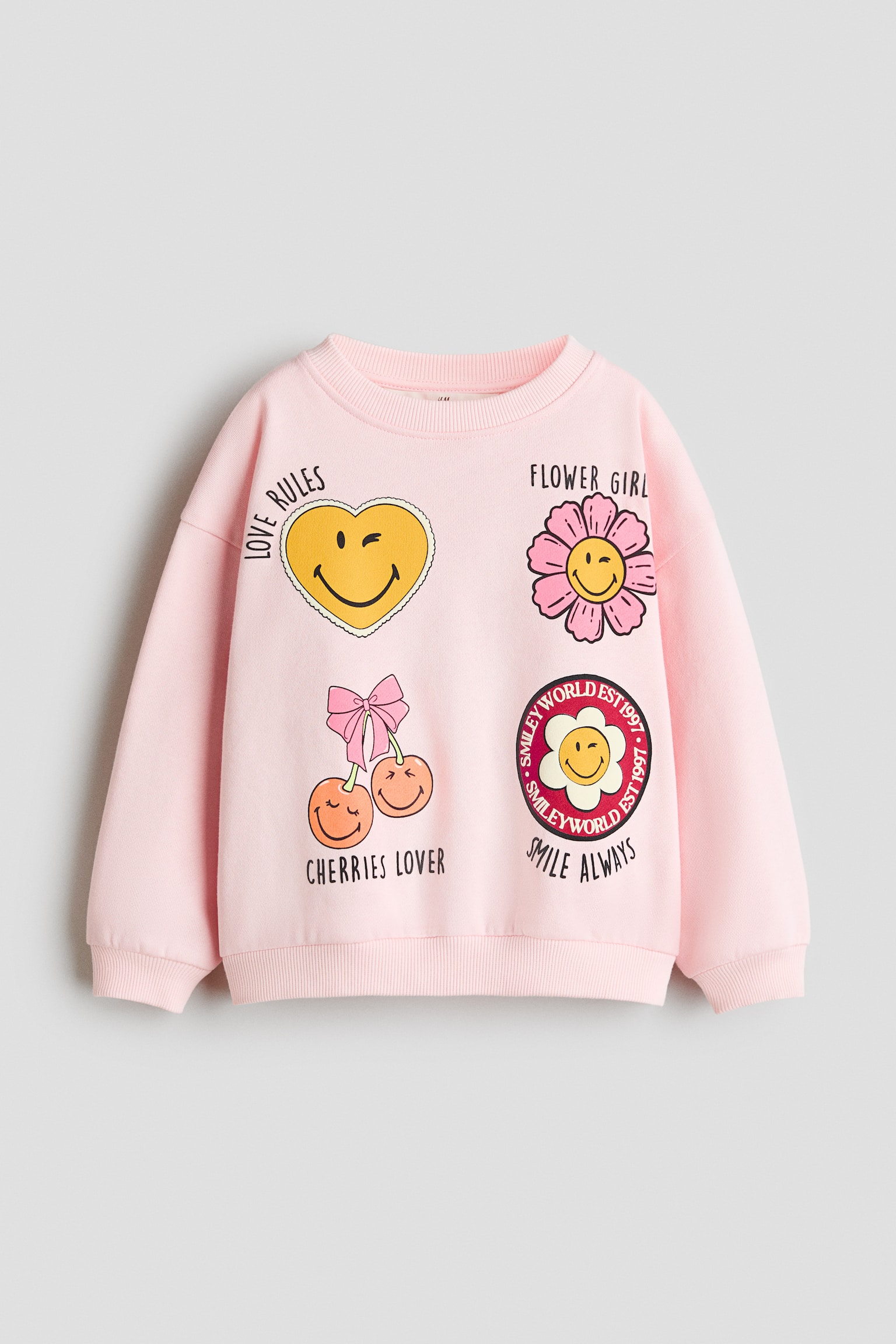 Sudadera oversize estampada - Rosa claro/SmileyWorld®/Blanco/Las guerreras K-pop/Rosa/Minions/Azul claro/Peppa Pig/Beige claro/Lilo y Stitch