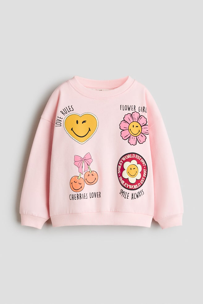 Oversized Printed Sweatshirt - Light pink/SmileyWorld®/Pink/Minions/White/K-Pop Demon Hunters/Light blue/Peppa Pig/Light beige/Lilo & Stitch - 1