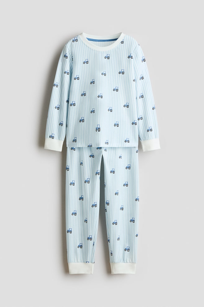 Printed cotton pyjamas - Light blue/Tractors/Cream/Vehicles/Cream/Stegosauruses/Navy blue/Galaxy Travels/Navy blue/Rockets/Dusty green/Dinosaurs - 1