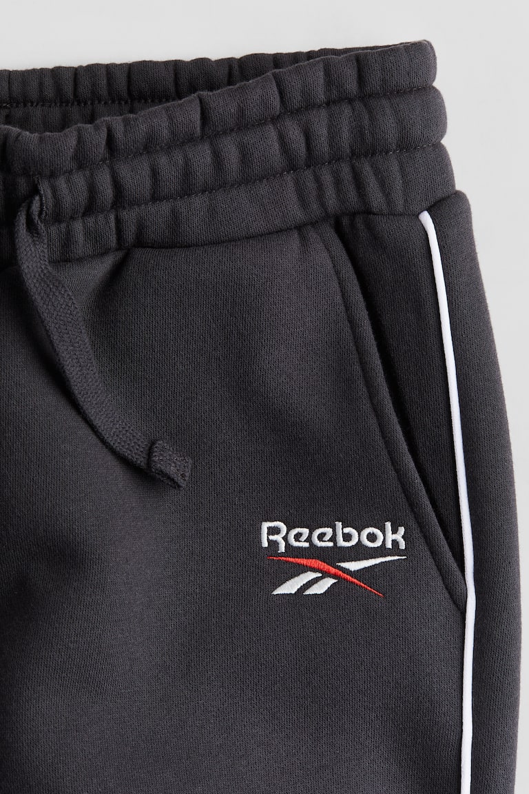 Abbigliamento Pantaloni Pantaloni Tuta Reebok Bambino Pantaloni
