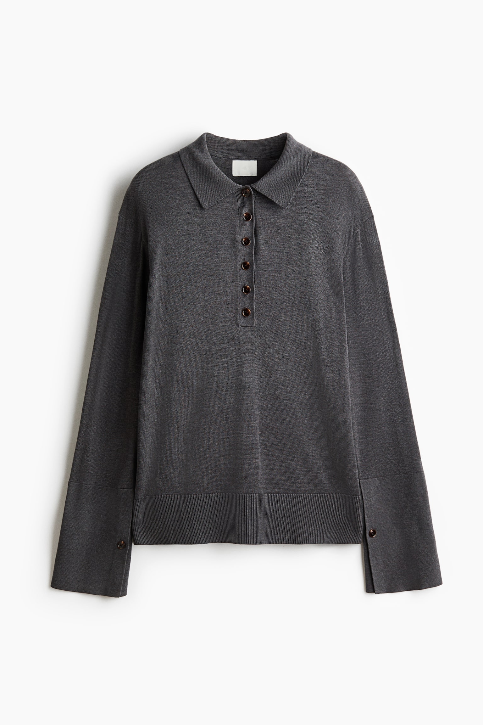 A front-facing view of a dark grey, fine-knit polo shirt featuring a classic collar with a six-button placket and dropped shoulders. The long sleeves feature wide cuffs with a long slit and a single button, while a ribbed band finishes the hem.