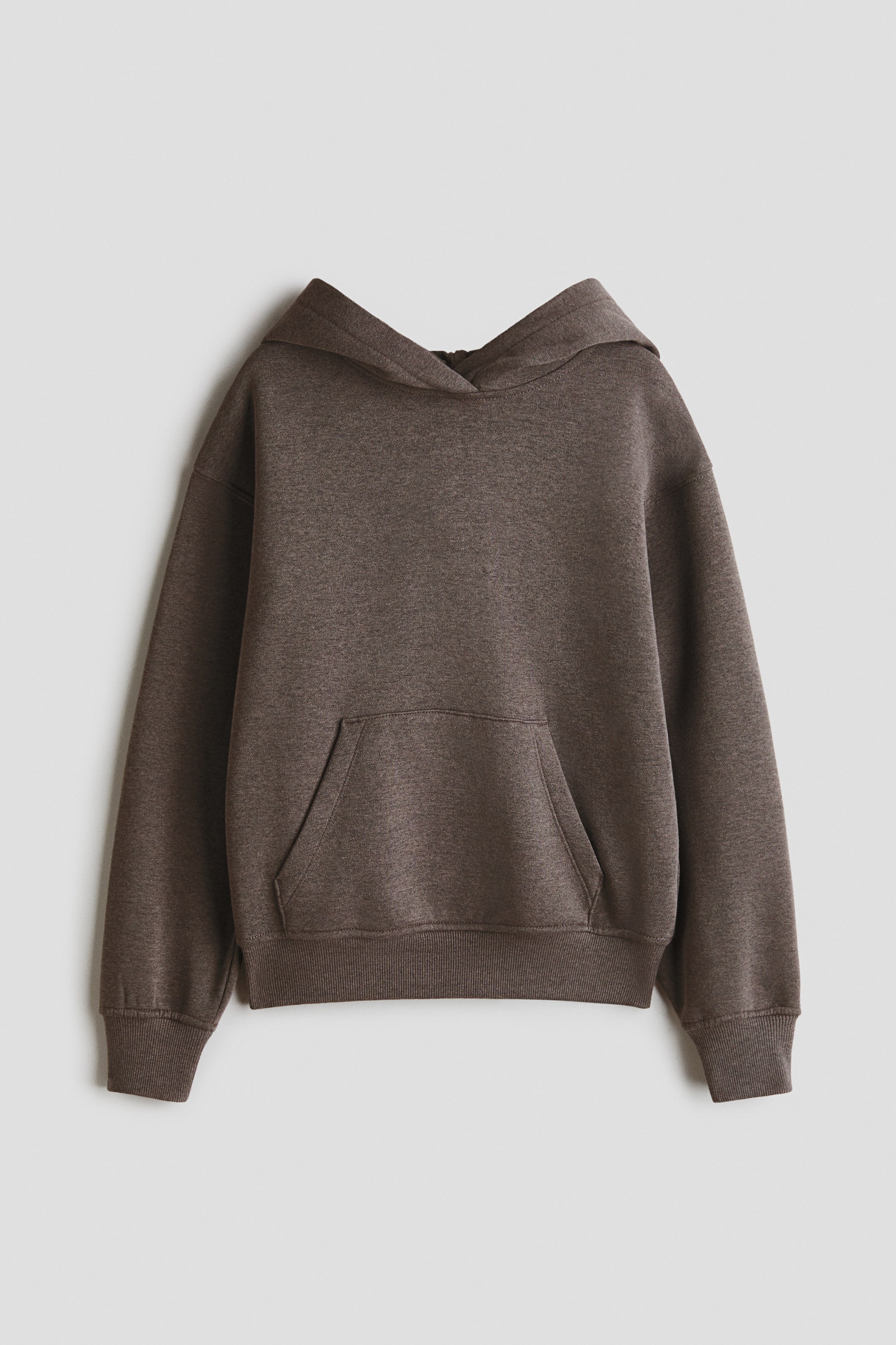 View larger image: A loose-fit, mottled dark brown hoodie is shown from the front, featuring a wrapover hood, dropped shoulders, long sleeves, a kangaroo pocket, and ribbed cuffs and hem.