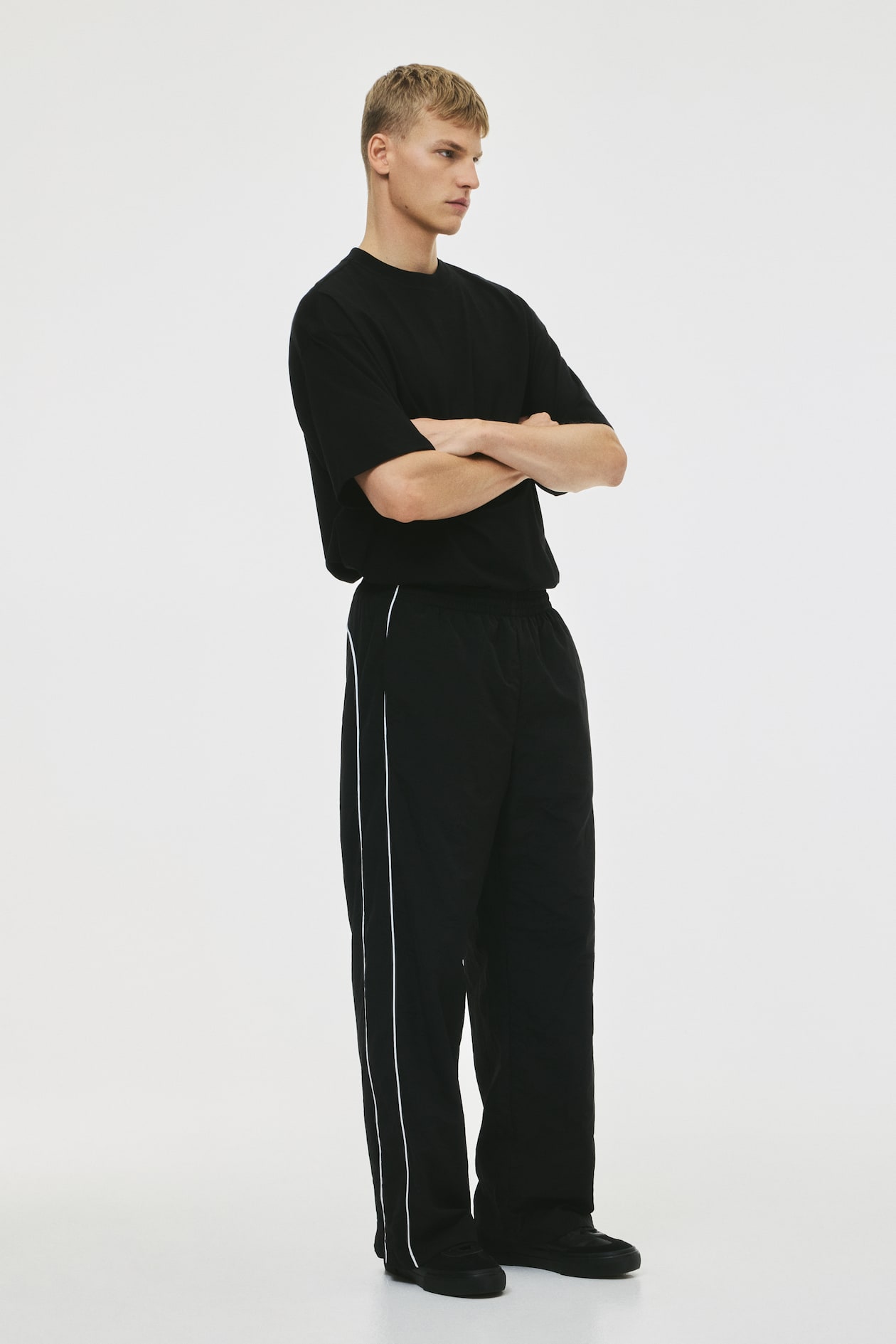 Relaxed Fit Nylon track pants Black Men H&M IN