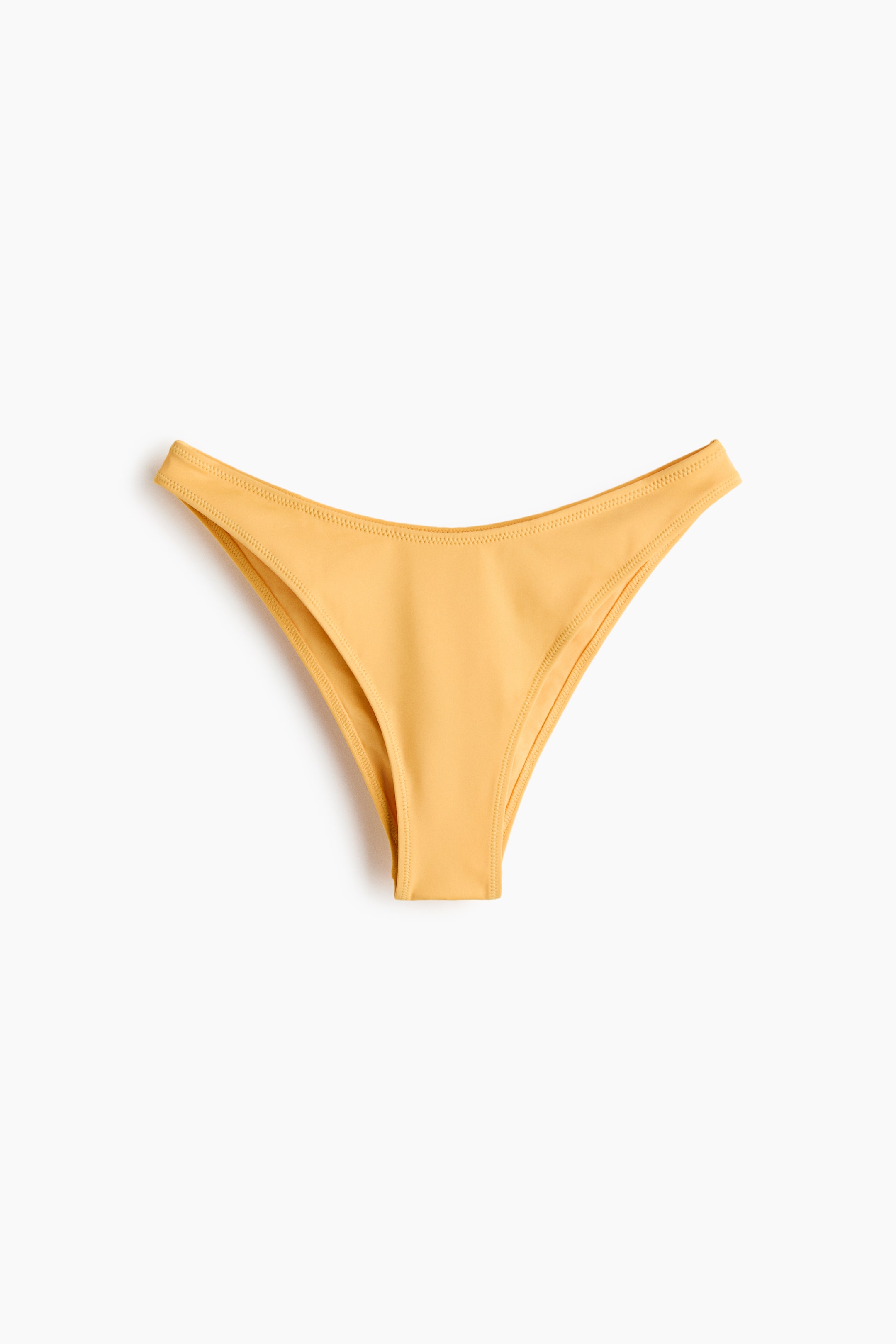 View larger image: Yellow, fully lined bikini bottoms are featuring a low, curved waist and a cutaway coverage design, viewed from the FRONT.