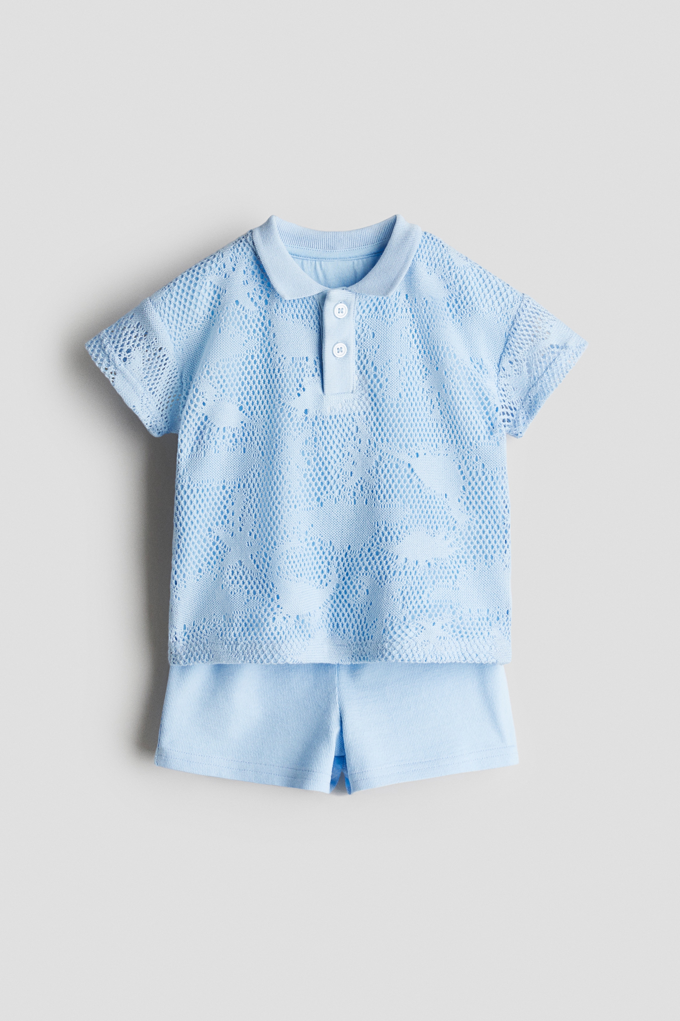 2-delt sæt med poloshirt og shorts - Lyseblå