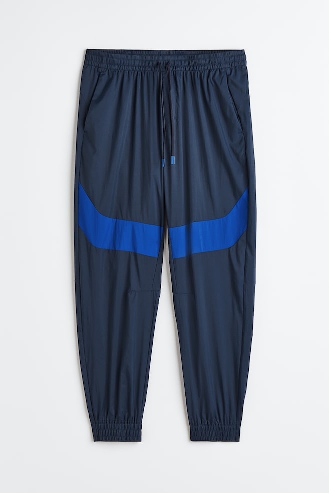 Water-repellent track pants - Dark blue/Bright blue/Black/Light grey - 2