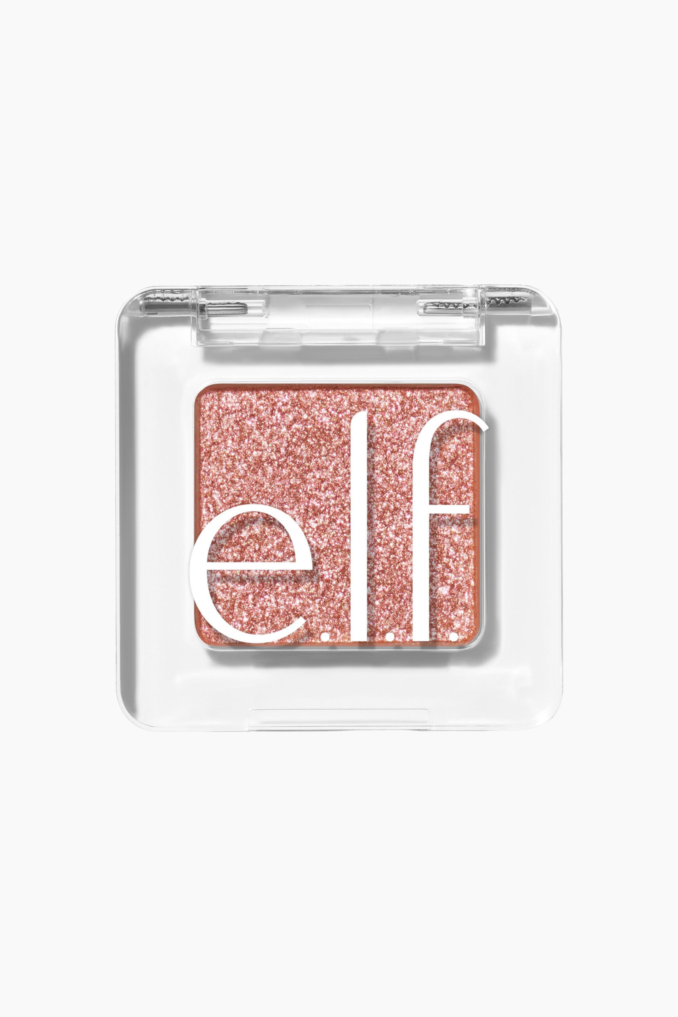 Visa större bild: Ett litet, fyrkantigt, genomskinligt plastetui för ögonskugga innehåller en pan med roséguldig, glittrig ögonskugga. Den vita "e.l.f."-logotypen är tydligt synlig över ögonskuggans yta.