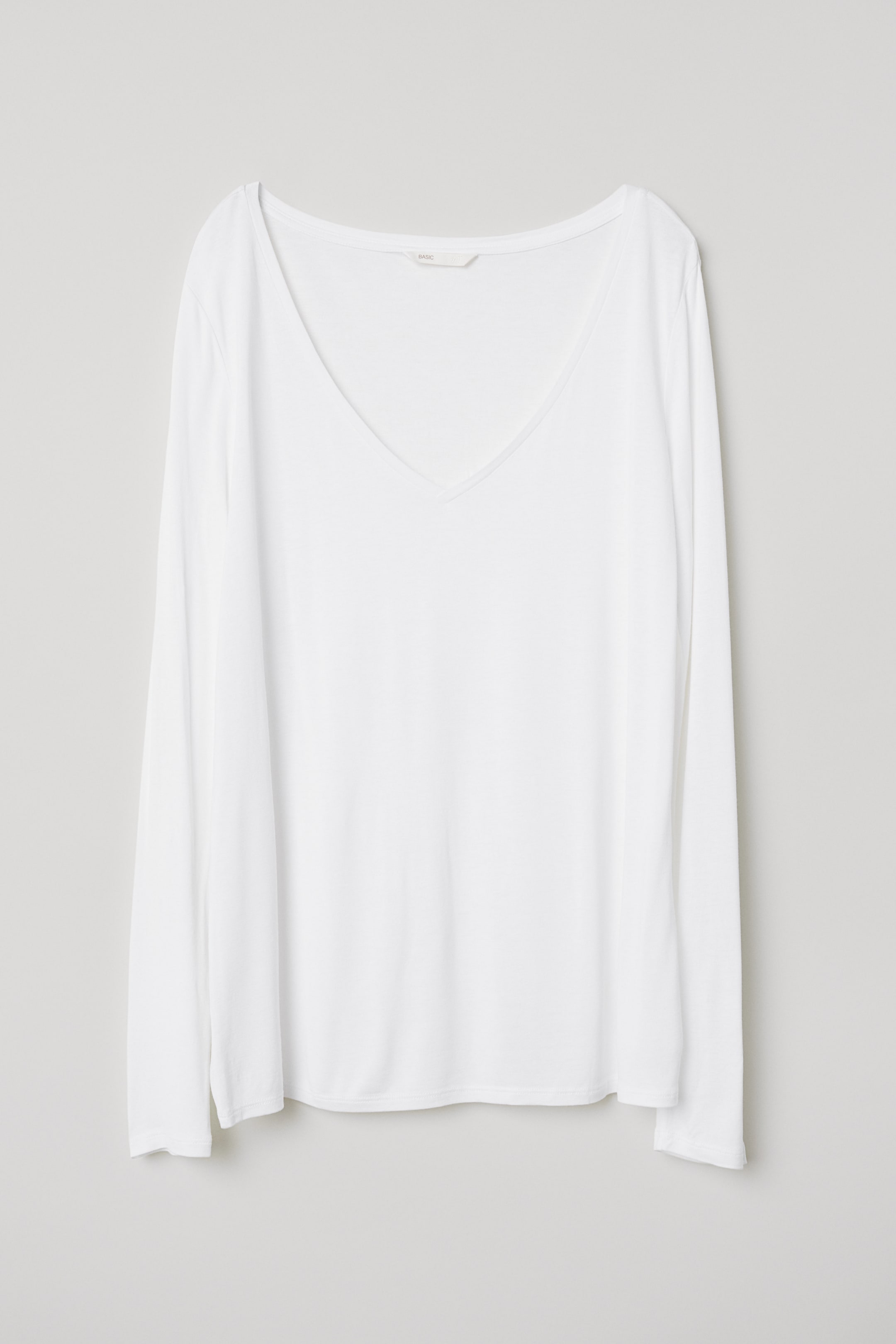 V-neck jersey top - V-neck - Long sleeve - White - Ladies | H&M GB