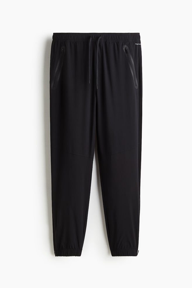 Regular Fit Sports joggers with DryMove™ - Black/Dark green/Patterned - 1